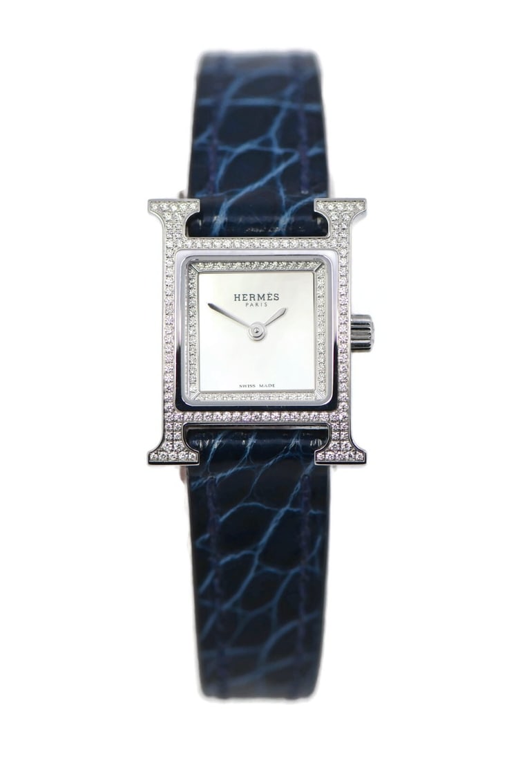 Hermes H Diamond Bezel Stainless Steel Quartz Watch HH1.132 with Box: Hermes H Diamond Bezel Stainless Steel Quartz Watch HH1.132 with Box This exquisite Hermes H Diamond Stainless Steel Watch (Model HH1.132) features a sleek design crafted from high-quality stainless s