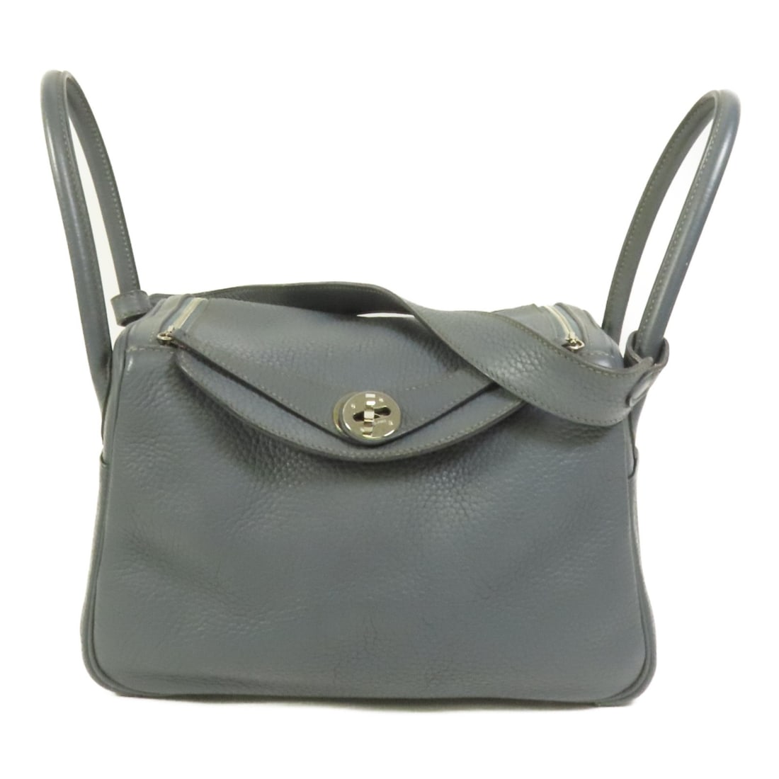 Hermes Lindy 26 Clemence Leather Shoulder Bag with Palladium Hardware Blue: Hermes Lindy 26 Clemence Leather Shoulder Bag with Palladium Hardware Blue This Hermes Lindy 26 is a versatile 2-way shoulder bag crafted from Clemence calfskin leather in a blue shade known as Bleu O