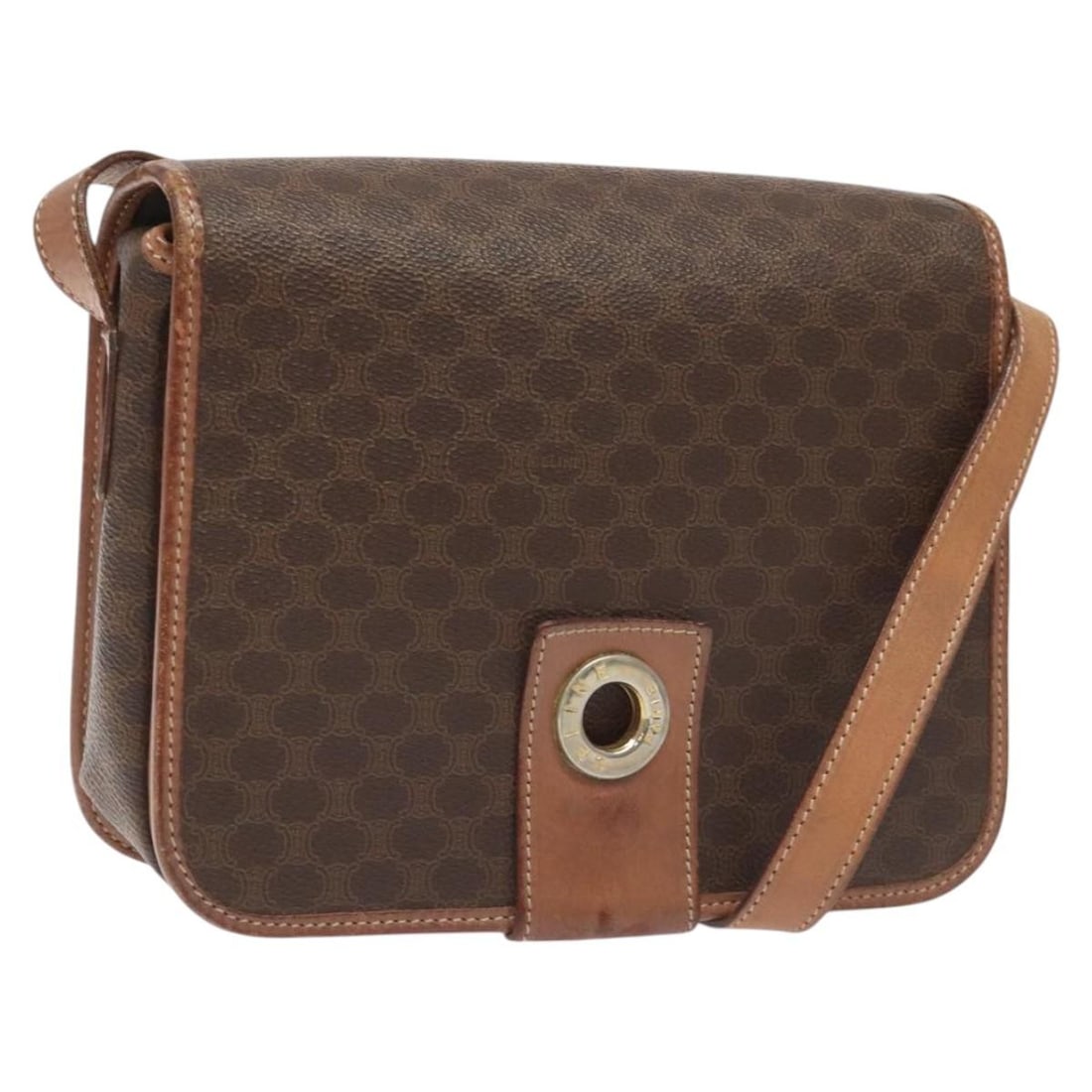 Macadam Shoulder Purse in Brown by Celine: Macadam Shoulder Purse in Brown by Celine This Celine Macadam shoulder bag features a classic brown exterior with leather accents. The bag shows signs of rubbing and slight loss of shape on the outsid