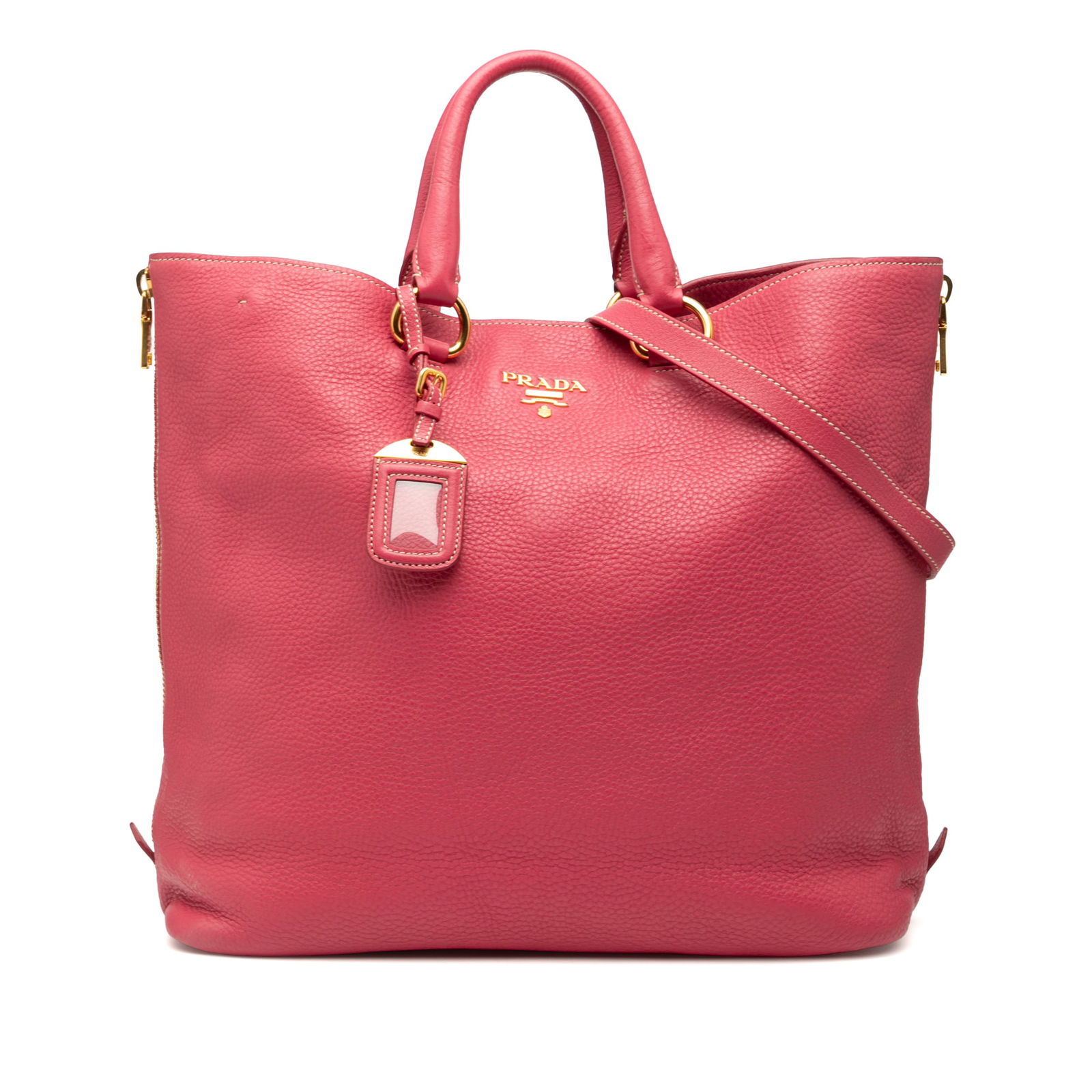 Pink Leather Convertible Tote with Side Zips by Prada Vitello Daino: Pink Leather Convertible Tote with Side Zips by Prada Vitello Daino This Prada Vitello Daino Side Zip Convertible Tote features a pink leather body with rolled leather handles, a detachable flat leath