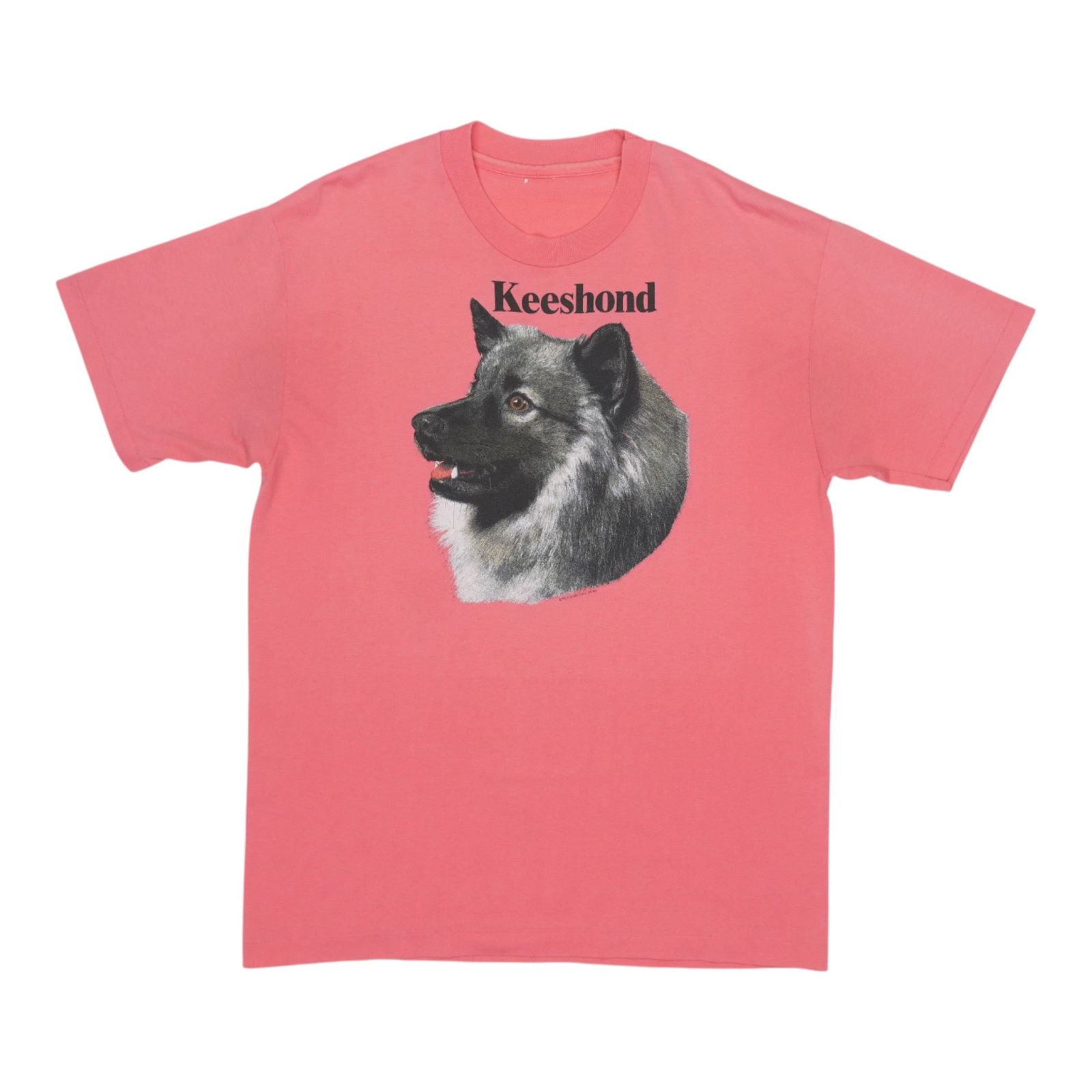 Vintage 1990 Keeshond Dog Graphic T-Shirt Pink: Vintage 1990 Keeshond Dog Graphic T-Shirt Pink This original vintage Keeshond Dog shirt from 1990 is a unique find for dog lovers and vintage apparel enthusiasts. Made from a comfortable 50/50 Poly/Co