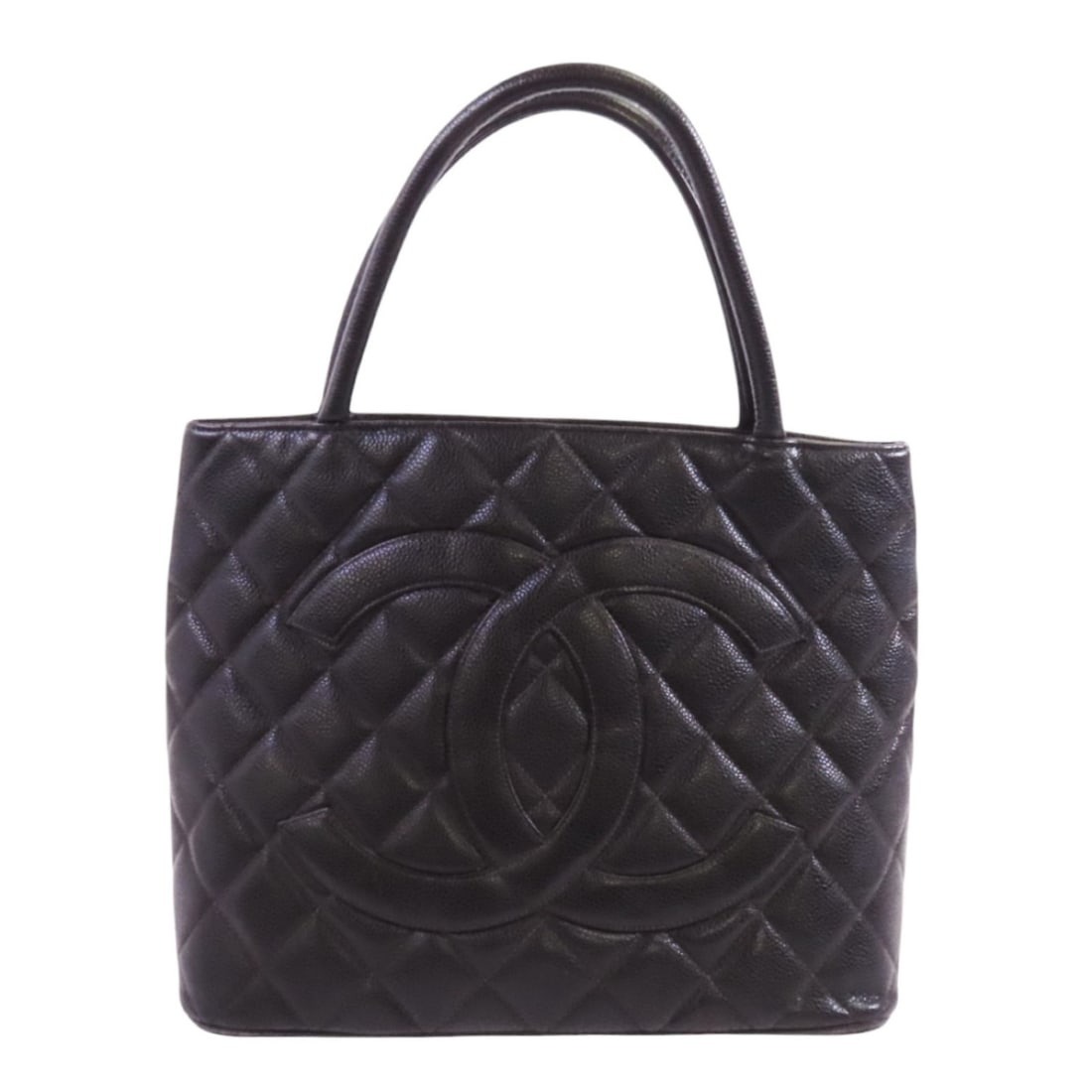 CHANEL Vintage Black Calfskin Tote Handbag with GHW: CHANEL Vintage Black Calfskin Tote Handbag with GHW This exquisite vintage CHANEL handbag showcases a classic design, crafted from luxurious black calfskin leather. The handbag features a sleek black