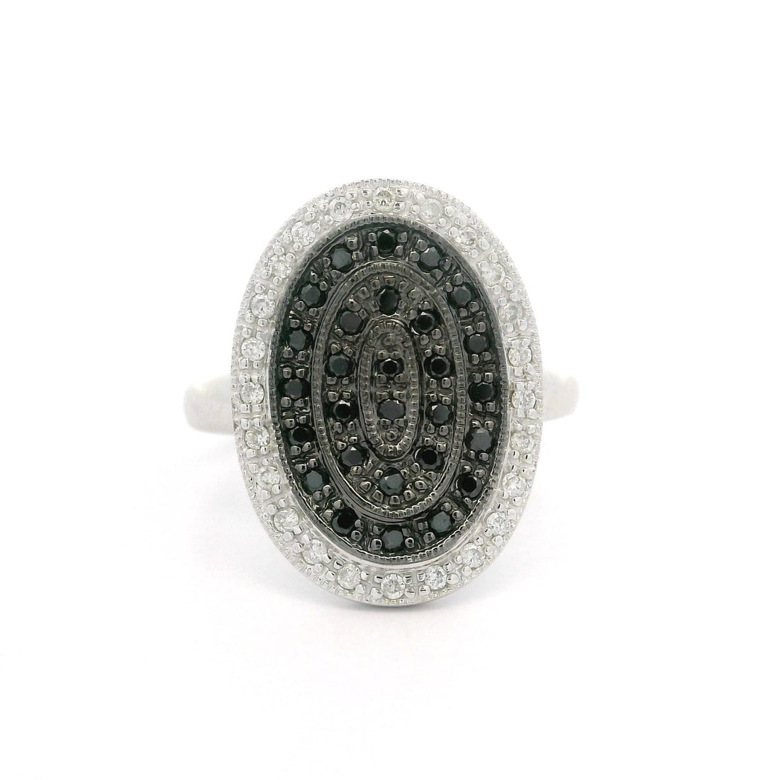 14k White Gold Concentric Oval Ring with 0.50ctw White Black Diamonds: 14k White Gold Concentric Oval Ring with 0.50ctw White Black Diamonds This stunning 14k White Gold ring features an exquisite design showcasing concentric ovals adorned with a total of 0.50ctw of natu