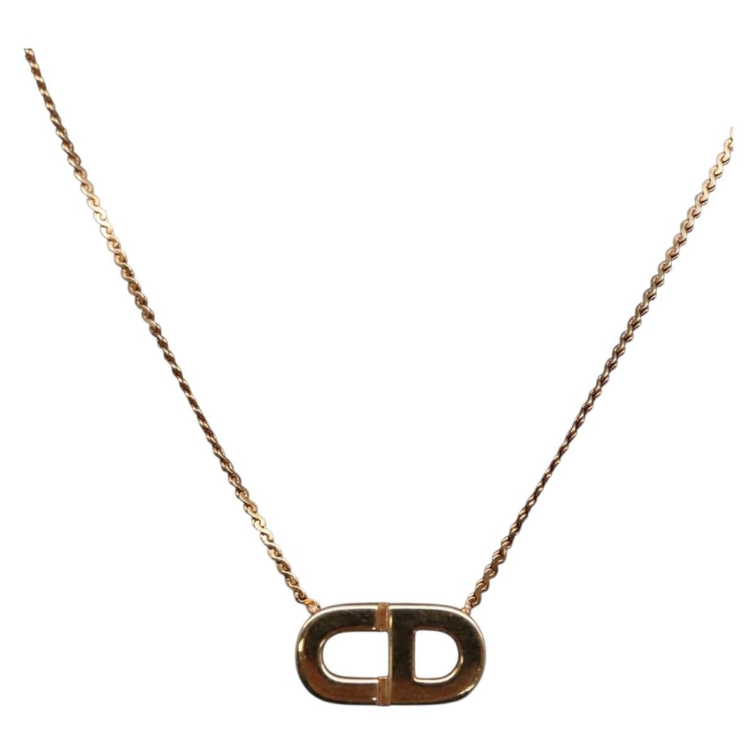 Gold Tone Metal Necklace by Christian Dior with Box: Gold Tone Metal Necklace by Christian Dior with Box This Christian Dior necklace features a gold tone metal construction and comes with its original item box. Made in Germany, the necklace measures ap