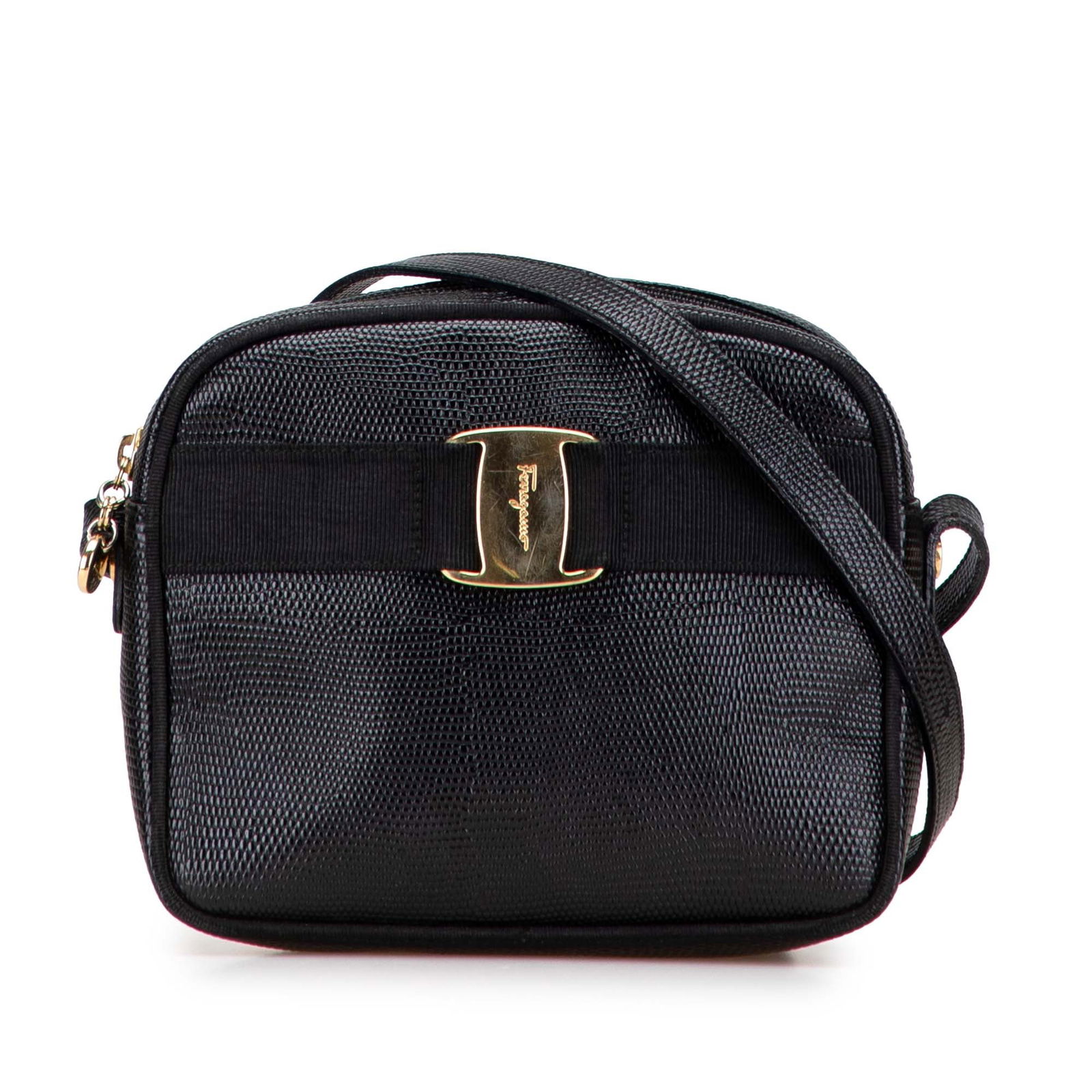 Ferragamo Black Embossed Lizard Leather Vara Crossbody Bag: Ferragamo Black Embossed Lizard Leather Vara Crossbody Bag Introducing the Ferragamo Embossed Lizard Leather Vara Crossbody, a sophisticated accessory that combines luxury and practicality. Crafted fr