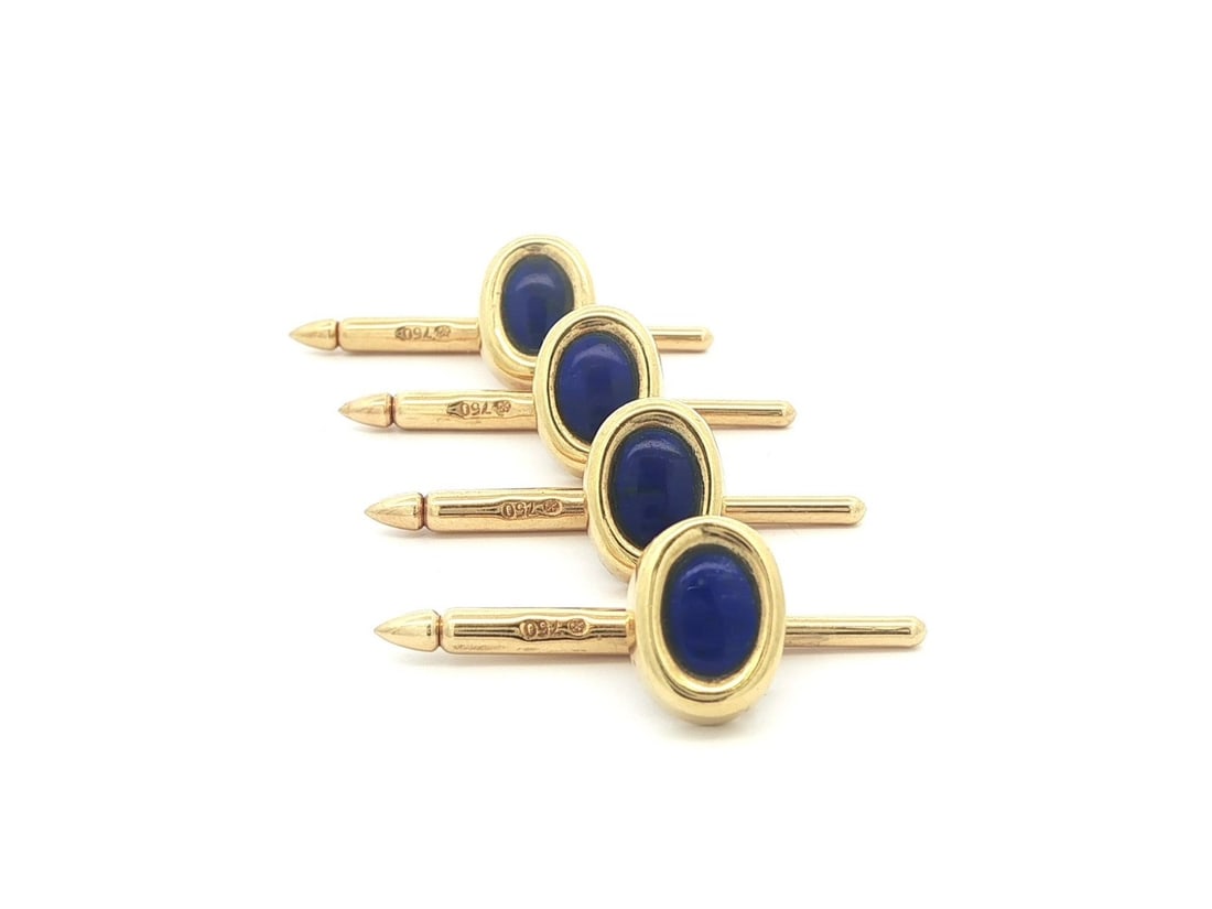 Four Piece Vintage 18k Yellow Gold Blue Lapis Lazuli Tuxedo Stud Set: Four Piece Vintage 18k Yellow Gold Blue Lapis Lazuli Tuxedo Stud Set This vintage tuxedo set features four oval studs crafted from solid 18k yellow gold, each set with a natural genuine lapis lazuli c