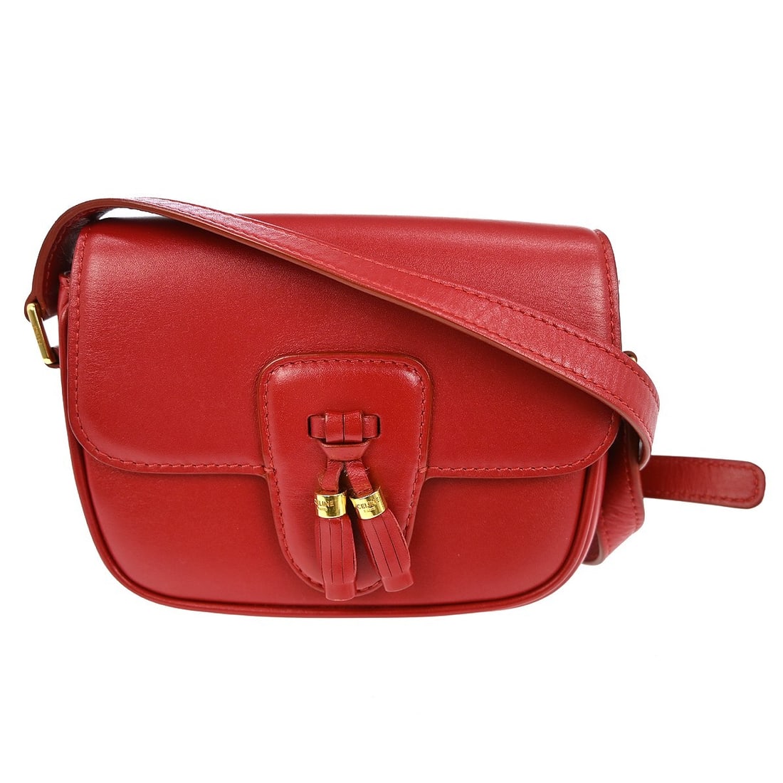Celine Red Leather Small Shoulder Bag with Gold Tone Logo Accent: Celine Red Leather Small Shoulder Bag with Gold Tone Logo Accent This Celine red shoulder bag features a small, structured design with a black leather shoulder strap and gold-tone hardware. The bag is