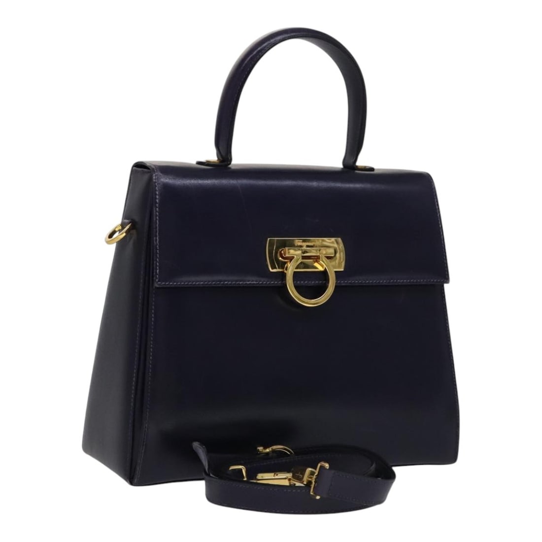 Purple Gancini Convertible Handbag by Salvatore Ferragamo: Purple Gancini Convertible Handbag by Salvatore Ferragamo This pre-owned Salvatore Ferragamo Gancini convertible top handle bag features a purple exterior and is designed for female use. The bag shows