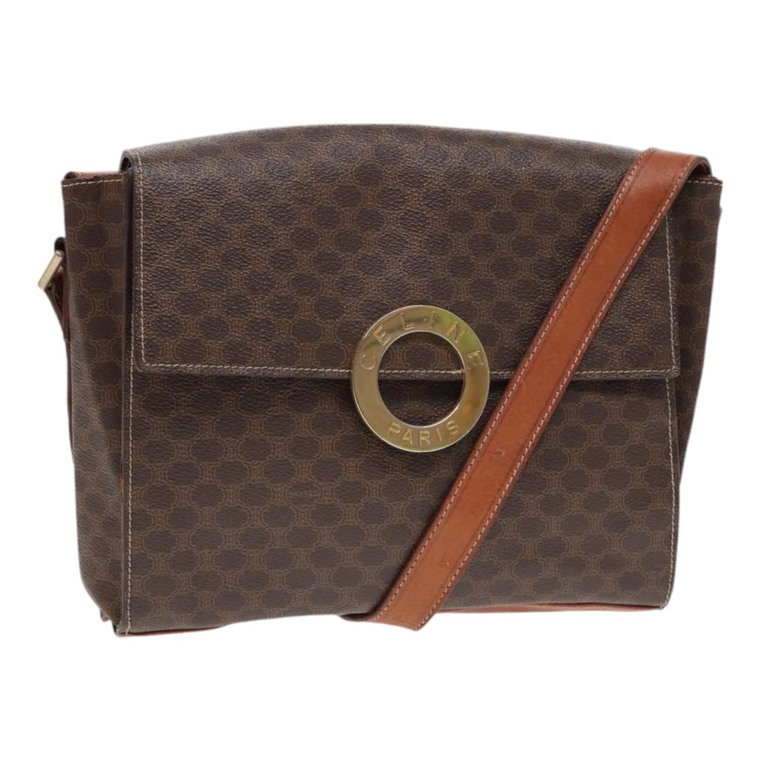 Vintage Celine Shoulder Purse with Macadam Circle Emblem in Brown: Vintage Celine Shoulder Purse with Macadam Circle Emblem in Brown This Celine vintage Macadam Circle Logo shoulder bag in brown features the iconic Macadam pattern and circle logo design. The bag show