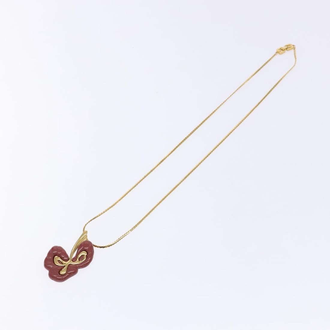 Vintage Gold Tone Necklace by Givenchy: Vintage Gold Tone Necklace by Givenchy This vintage Givenchy necklace features a classic gold finish and is designed for women. It is in very good condition with slight rubbing and some minor scratche