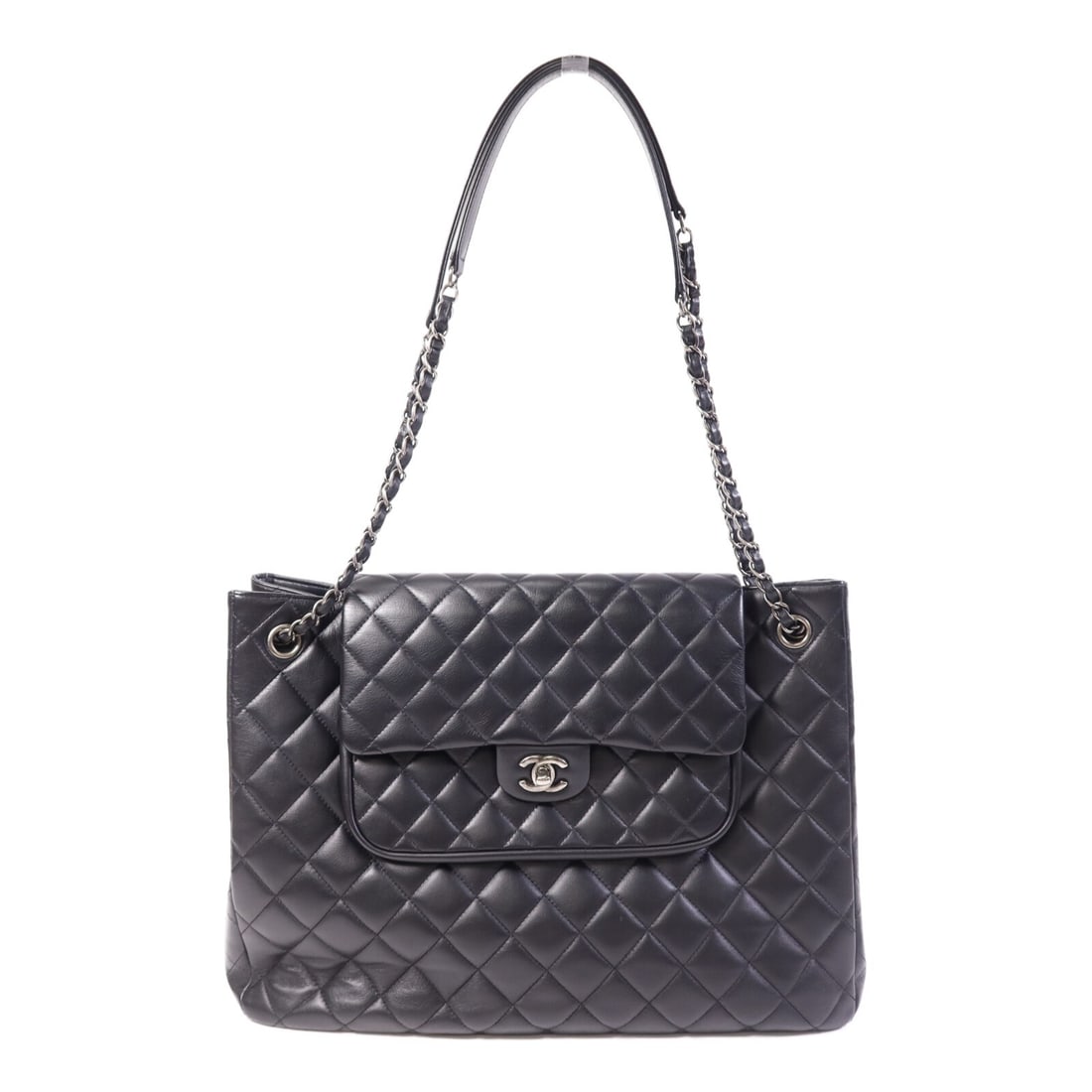 Chanel Classic Flap Black Calfskin Tote Shoulder Bag with Silver Tone Chain: Chanel Classic Flap Black Calfskin Tote Shoulder Bag with Silver Tone Chain This CHANEL Classic Flap Tote is crafted from black calfskin leather and features signature chain shoulder straps. The bag i