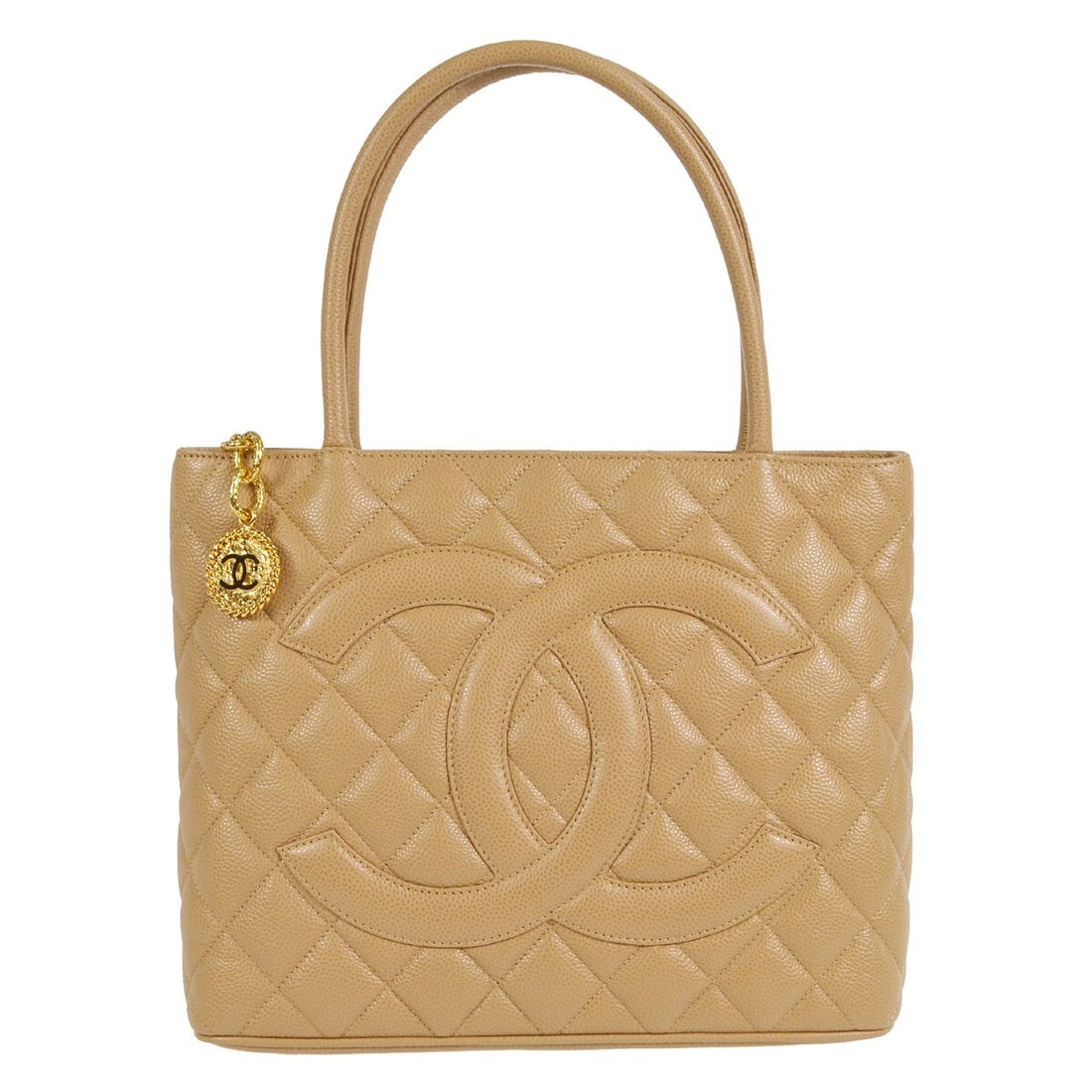 Chanel Beige Caviar Skin Medallion Tote Handbag: Chanel Beige Caviar Skin Medallion Tote Handbag This Chanel Beige Calfskin Medallion Tote Handbag is a stylish accessory designed for casual occasions. Crafted from luxurious caviar skin leather, it f