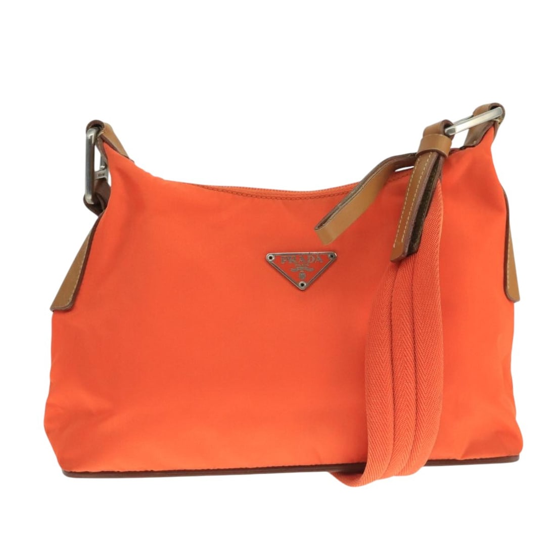 Orange Prada Vintage Shoulder Bag with Single Strap: Orange Prada Vintage Shoulder Bag with Single Strap This Prada vintage shoulder bag features an orange exterior with a structured silhouette. The surface and shoulder strap display some loss of shape