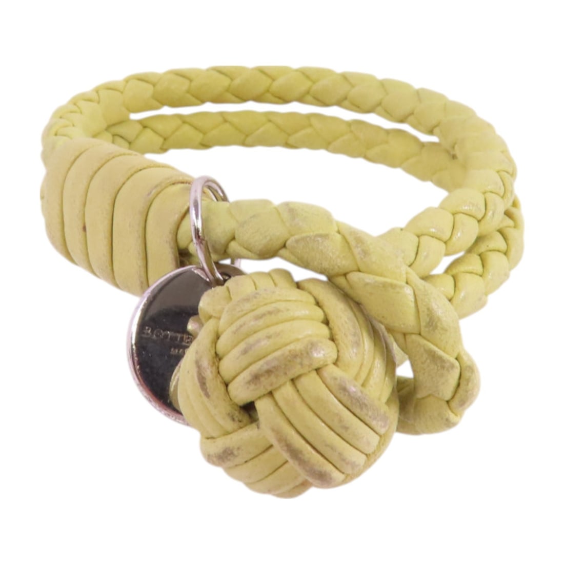Bottega Veneta Intrecciato Yellow Lambskin Leather Bracelet: Bottega Veneta Intrecciato Yellow Lambskin Leather Bracelet This Bottega Veneta Intrecciato Leather Bracelet is a stylish accessory crafted from premium lambskin leather in a vibrant yellow color. Des