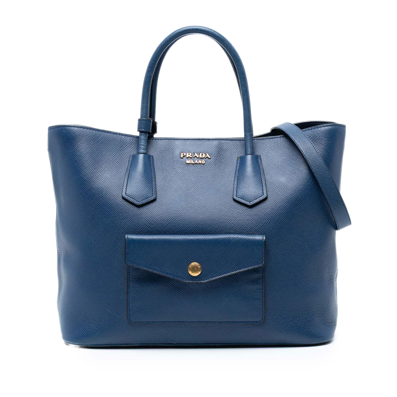 Prada Saffiano Cuir Convertible Tote Blue Leather Bag: Prada Saffiano Cuir Convertible Tote Blue Leather Bag This Prada Saffiano Cuir Front Pocket Convertible Tote is crafted from high-quality saffiano leather, showcasing a sophisticated blue hue. It feat
