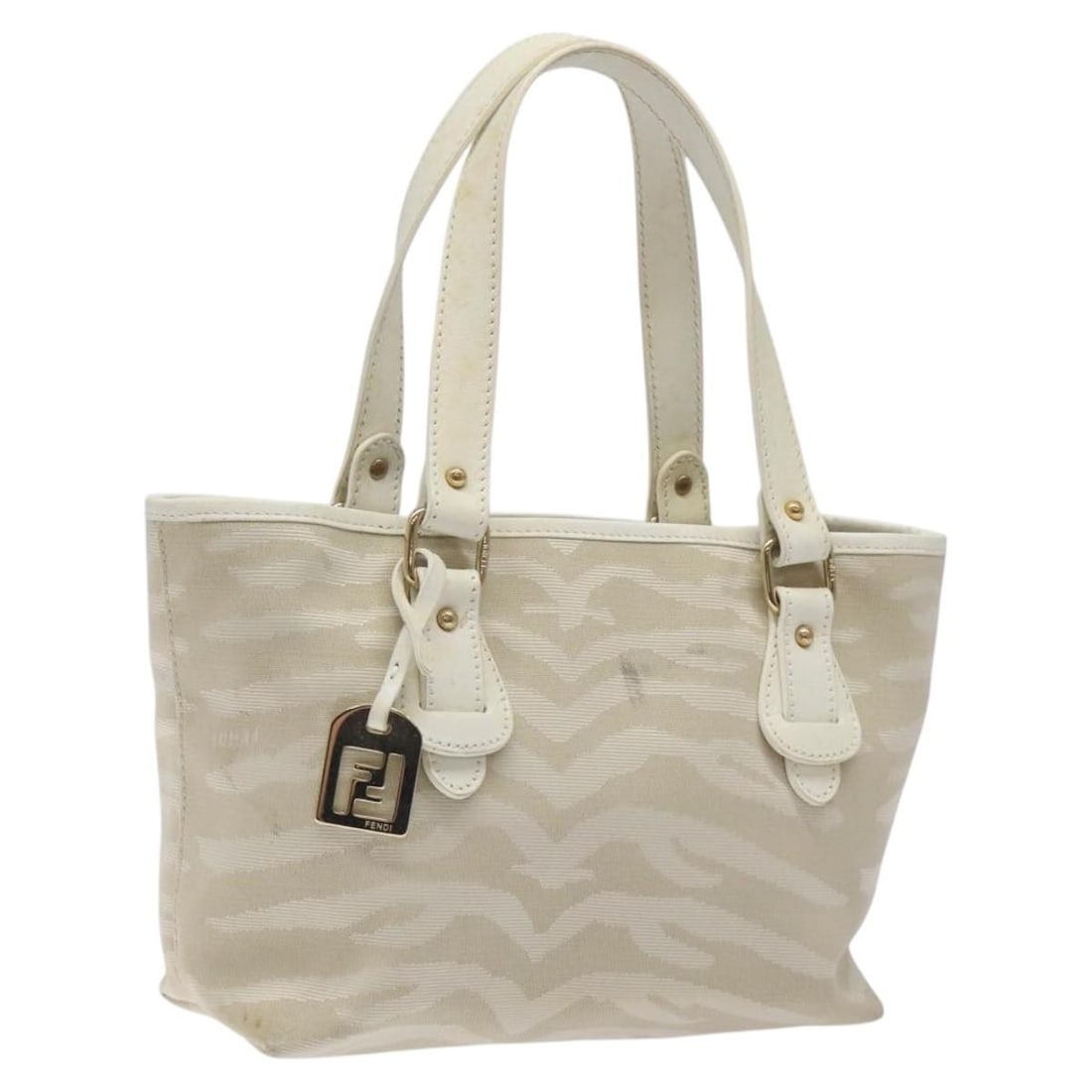 Tiger Pattern Tote Bag by Fendi in White Vintage Style: Tiger Pattern Tote Bag by Fendi in White Vintage Style This Fendi Vintage Tiger Tote in white features a structured design crafted for a feminine look. The exterior shows some loss of shape, rubbing,