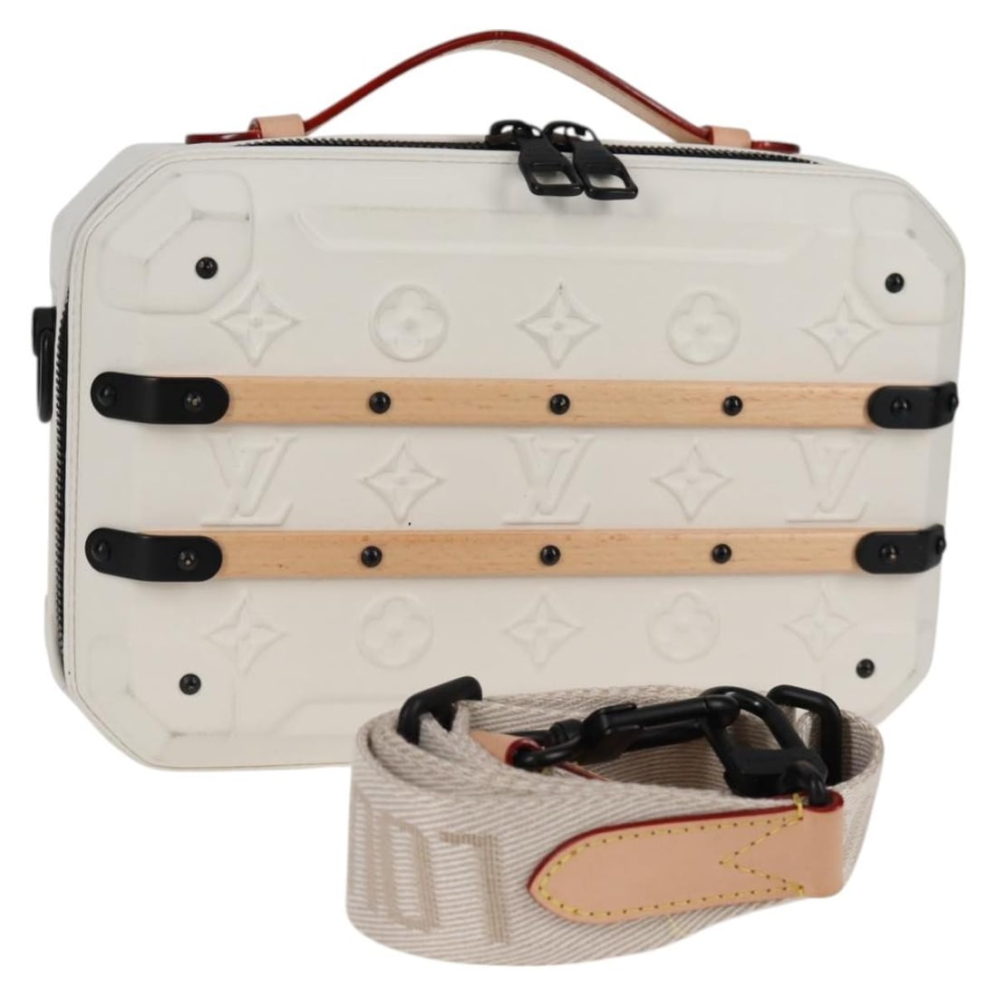 Louis Vuitton White Future Trunk Handbag: Louis Vuitton White Future Trunk Handbag This Louis Vuitton Future Trunk handbag in white features a structured silhouette with elegant lines. The exterior shows slight rubbing, minor stains, and subt