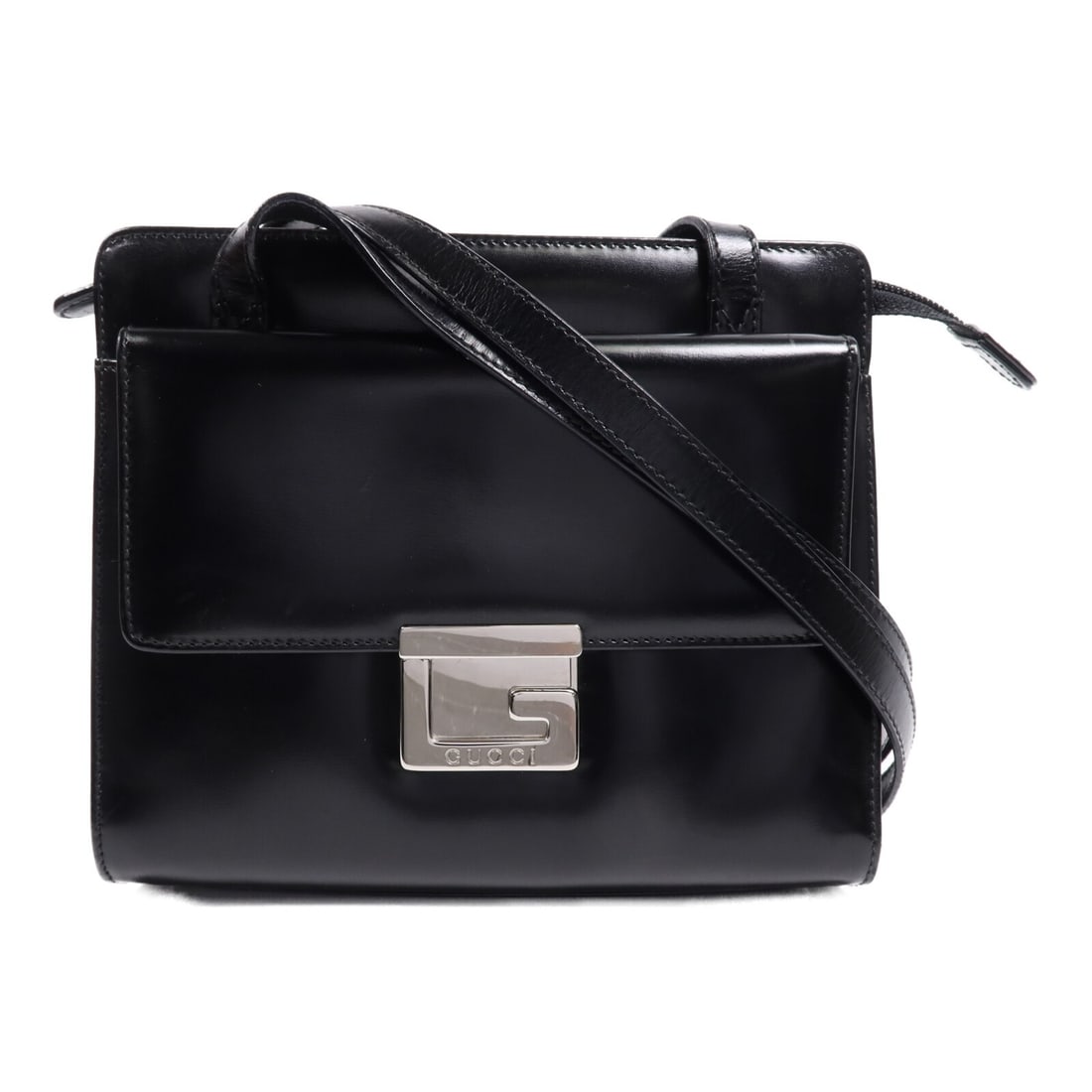 GUCCI Vintage Black Calfskin Leather Shoulder Bag SHW: GUCCI Vintage Black Calfskin Leather Shoulder Bag SHW This vintage GUCCI shoulder bag is crafted from luxurious black calfskin leather, showcasing the brand's signature elegance. With a compact design