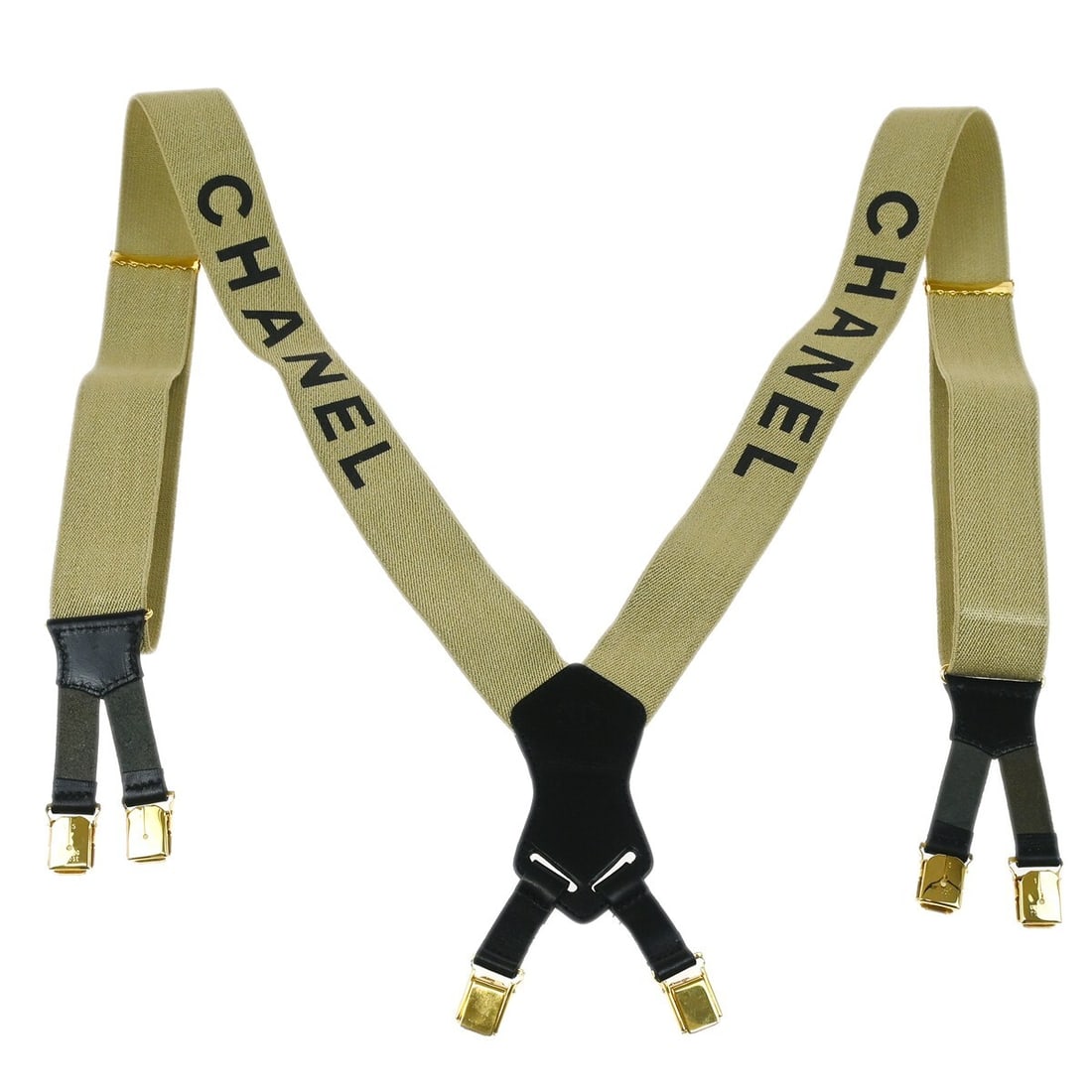 Chanel Beige and Black Gold Tone Logo Suspenders: Chanel Beige and Black Gold Tone Logo Suspenders Chanel logo suspenders in beige and black with gold-tone accents. These suspenders are designed for women and feature minor signs of use, including lig