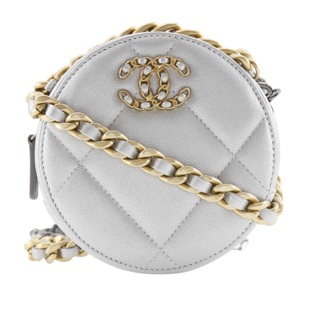 Chanel 19 Silver Round Chain Shoulder Bag: Chanel 19 Silver Round Chain Shoulder Bag This Chanel 19 Round Clutch with Chain is a stylish shoulder bag designed for women. The bag is crafted in a silver tone and remains in excellent condition, s