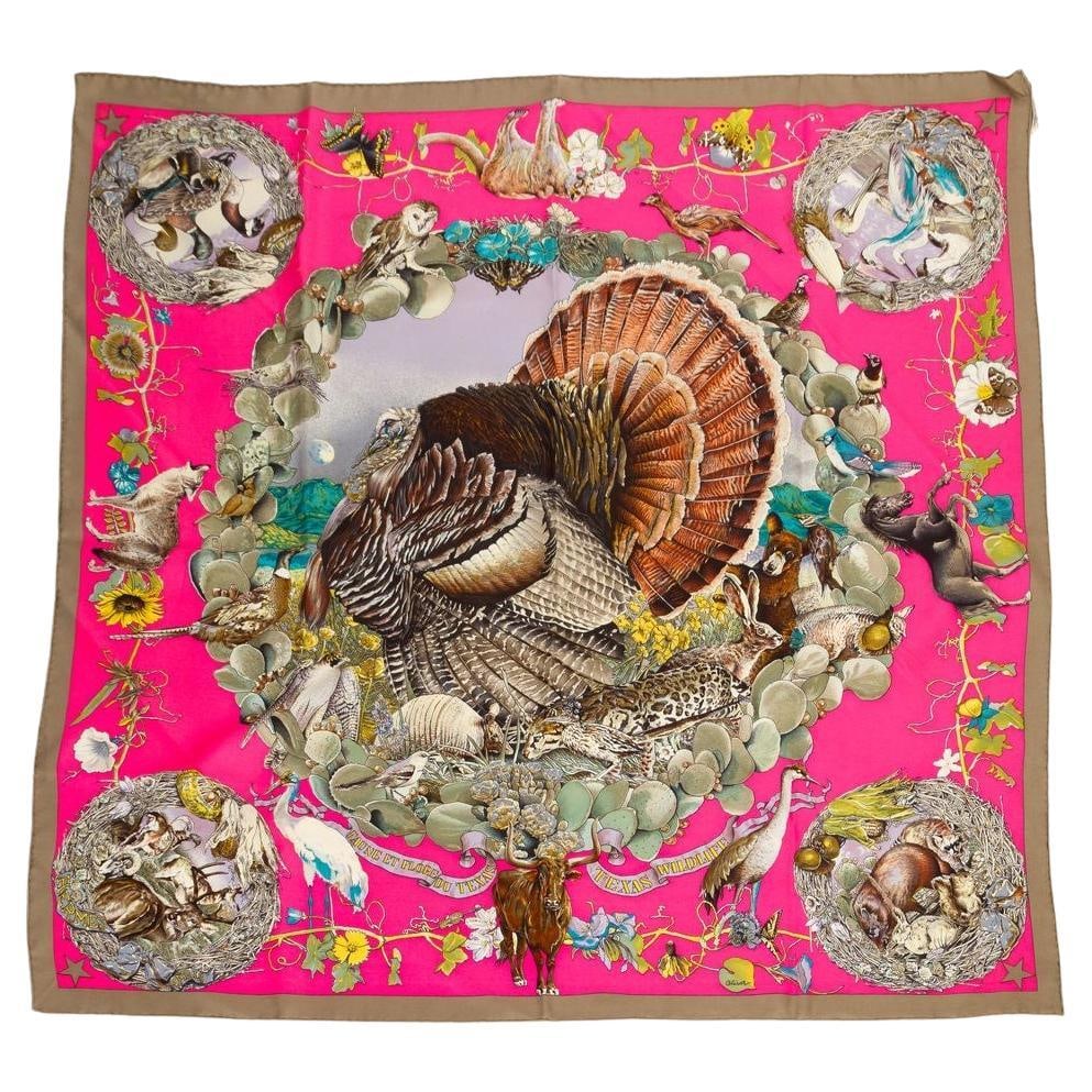 Hermes Faune et Flore du Texas Silk Scarf 34x34 inches: Hermes Faune et Flore du Texas Silk Scarf 34x34 inches This exquisite Hermes "Faune et Flore du Texas" scarf showcases a vibrant wildlife motif in a delightful pink color way. Crafted from 100% silk,