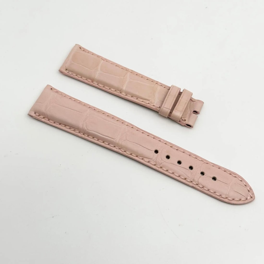 Bvlgari Pink Alligator Leather Strap 19mm X 16mm Two-Piece: Bvlgari Pink Alligator Leather Strap 19mm X 16mm Two-Piece This stunning pink alligator leather strap by Bvlgari is designed for luxury and style. The two-piece strap features a width of 19mm at the b