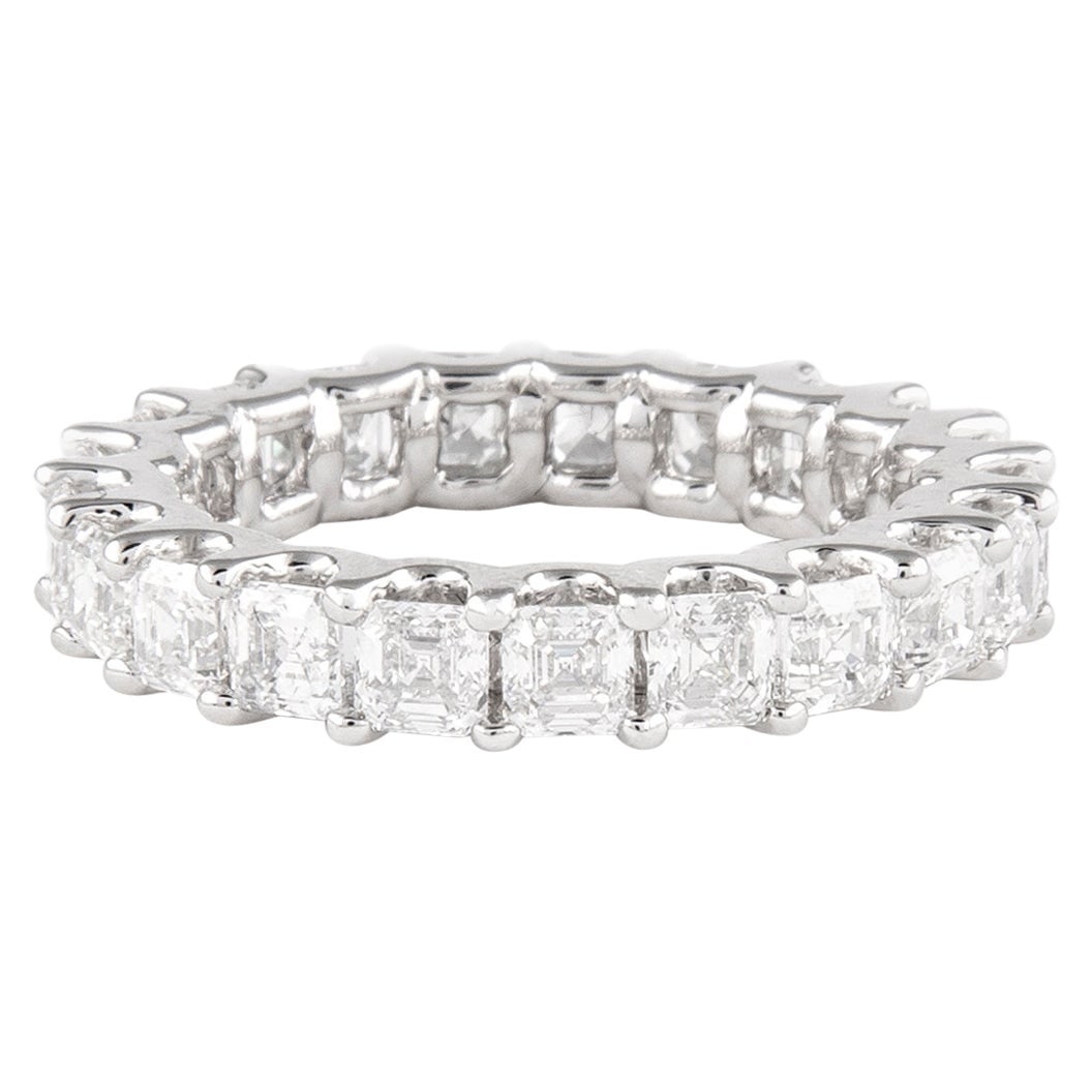 3.05ct Asscher Cut Diamond Eternity Band 18k White Gold: 3.05ct Asscher Cut Diamond Eternity Band 18k White Gold This stunning eternity band features 21 Asscher cut diamonds totaling 3.05 carats, exhibiting D/E color and VVS clarity. Crafted from 18k white