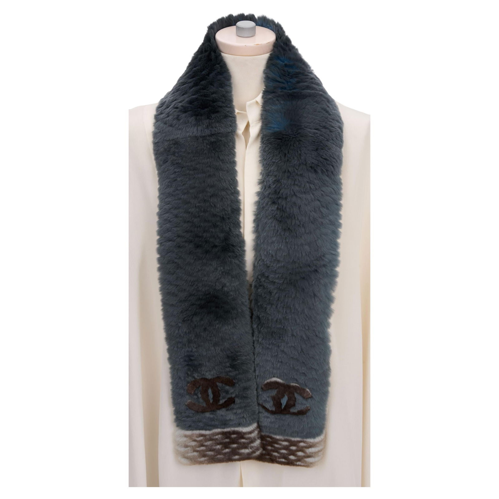 Chanel Orylag Fur Two-Tone Logo Scarf Made in Italy: Chanel Orylag Fur Two-Tone Logo Scarf Made in Italy Elevate your wardrobe with this luxurious Chanel Orylag Fur Two-Tone Logo Scarf. Expertly crafted in Italy, this exquisite accessory features the ic
