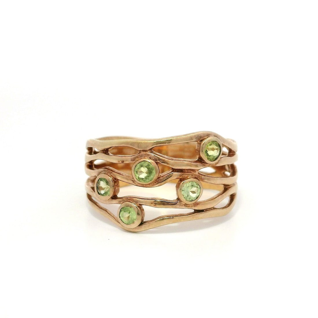 Rose Gold Plated Sterling Silver Wavy Band Ring with Natural Peridot: Rose Gold Plated Sterling Silver Wavy Band Ring with Natural Peridot Introducing a stunning Rose Gold Plated Sterling Silver Wavy Open Work Wide Band Ring, featuring a beautifully crafted design that