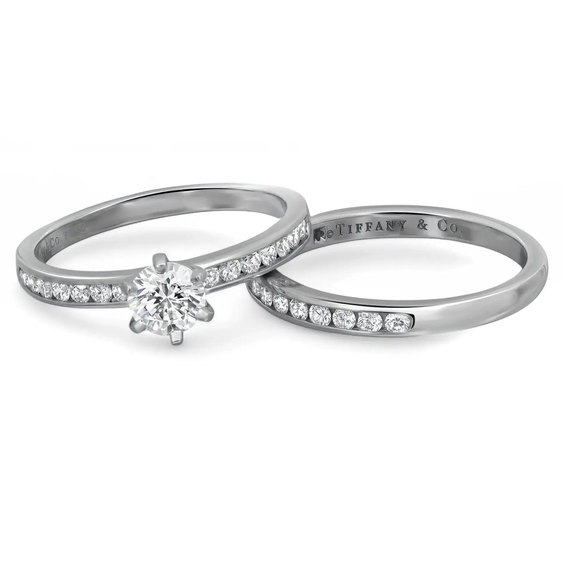 Tiffany & Co. Platinum 0.74ct Round Diamond Engagement Ring Set: Tiffany & Co. Platinum 0.74ct Round Diamond Engagement Ring Set This exquisite Tiffany & Co. engagement ring set features a stunning round cut diamond engagement ring crafted in solid Platinum 950. Th