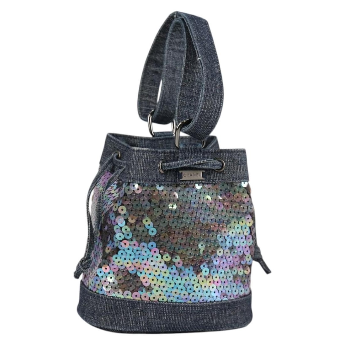 CHANEL Denim Blue Sequin Hand Bag CC Logo Made in France: CHANEL Denim Blue Sequin Hand Bag CC Logo Made in France Introducing the CHANEL Sequin Hand Bag in a stunning denim blue color. This stylish handbag is crafted from durable nylon, making it both fashi