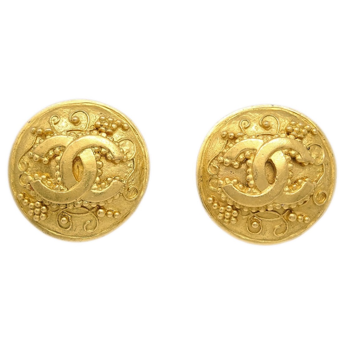 Chanel 96A Gold-Plated Button Clip-On Earrings: Chanel 96A Gold-Plated Button Clip-On Earrings Elevate your accessory collection with these exquisite Chanel Button Earrings. Featuring a classic round shape, these clip-on earrings are designed in a