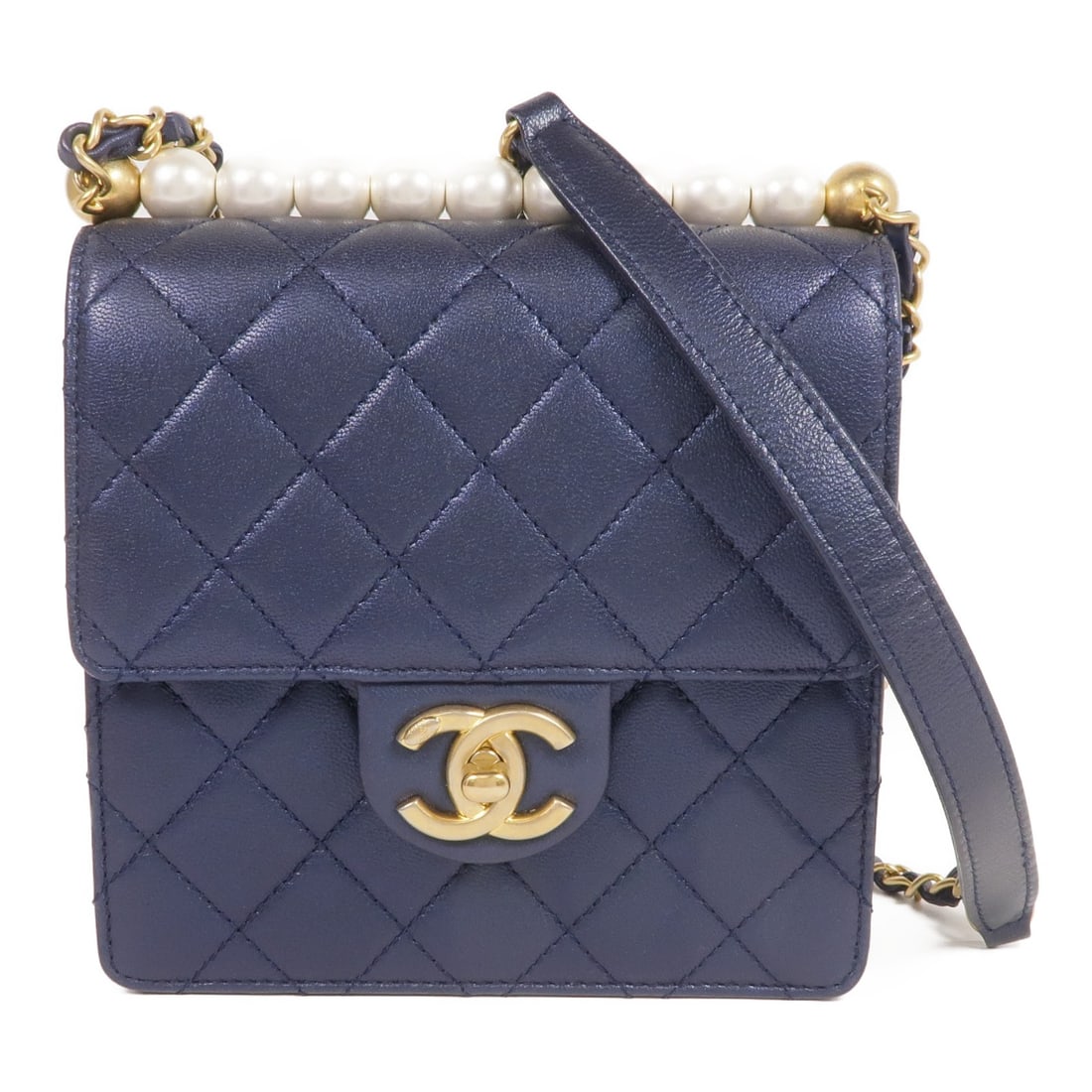 CHANEL Blue Calfskin Leather Shoulder Bag with GHW: CHANEL Blue Calfskin Leather Shoulder Bag with GHW This elegant CHANEL shoulder bag is crafted from luxurious blue calfskin leather, showcasing the brand's iconic craftsmanship. With a compact yet fun