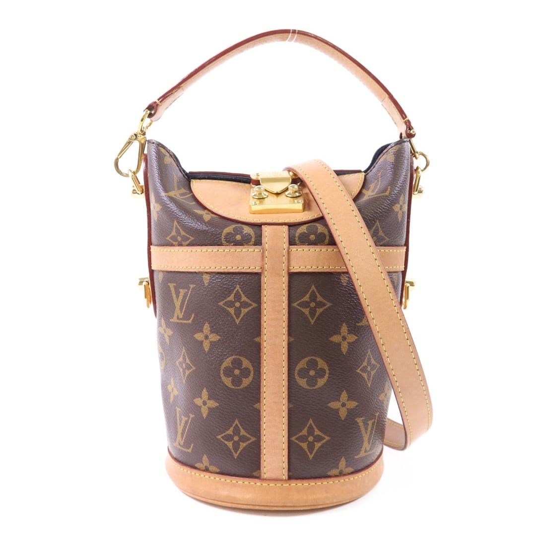 LOUIS VUITTON Monogram Brown 2 Way Shoulder Bag M43587: LOUIS VUITTON Monogram Brown 2 Way Shoulder Bag M43587 This Louis Vuitton Duffle 2 Way Shoulder Bag is crafted from durable PVC coated canvas in a classic brown monogram pattern. It features a versati