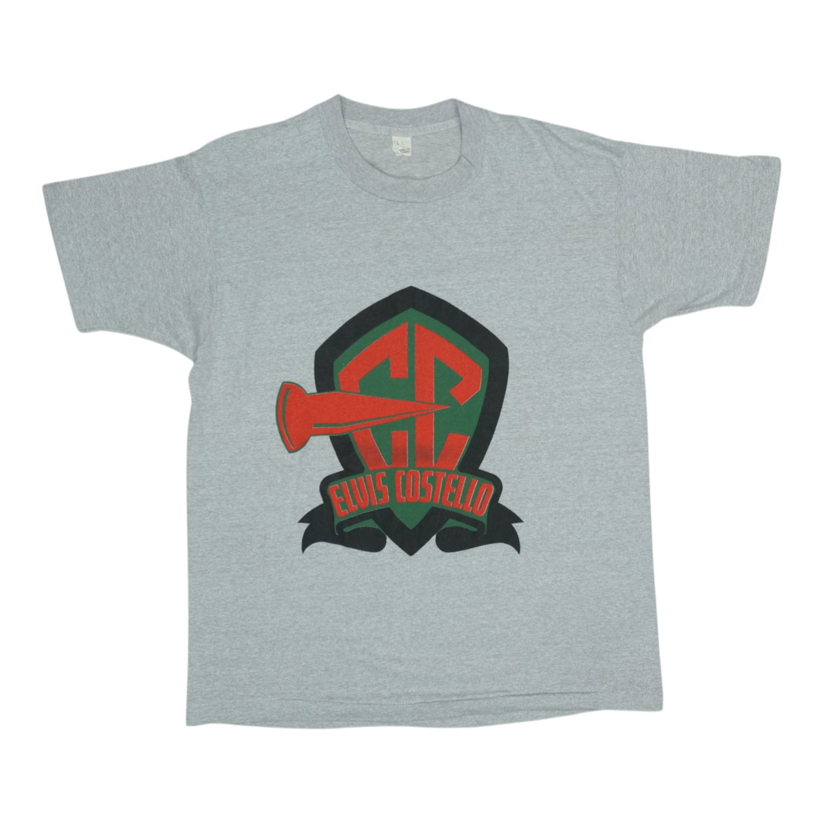 Vintage 1989 Elvis Costello Spike Tour Shirt Grey: Vintage 1989 Elvis Costello Spike Tour Shirt Grey Discover this original vintage 1989 Elvis Costello Spike Tour Shirt, a genuine piece of music memorabilia. This shirt features striking graphics on bo