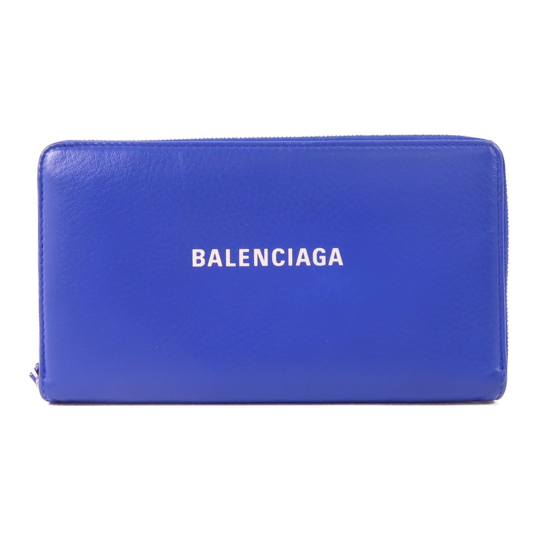 Blue Calfskin Leather Long Wallet by Balenciaga with Silver Hardware: Blue Calfskin Leather Long Wallet by Balenciaga with Silver Hardware This Balenciaga long wallet features a sleek zipper design and is crafted from high-quality blue calfskin leather. It offers a styl