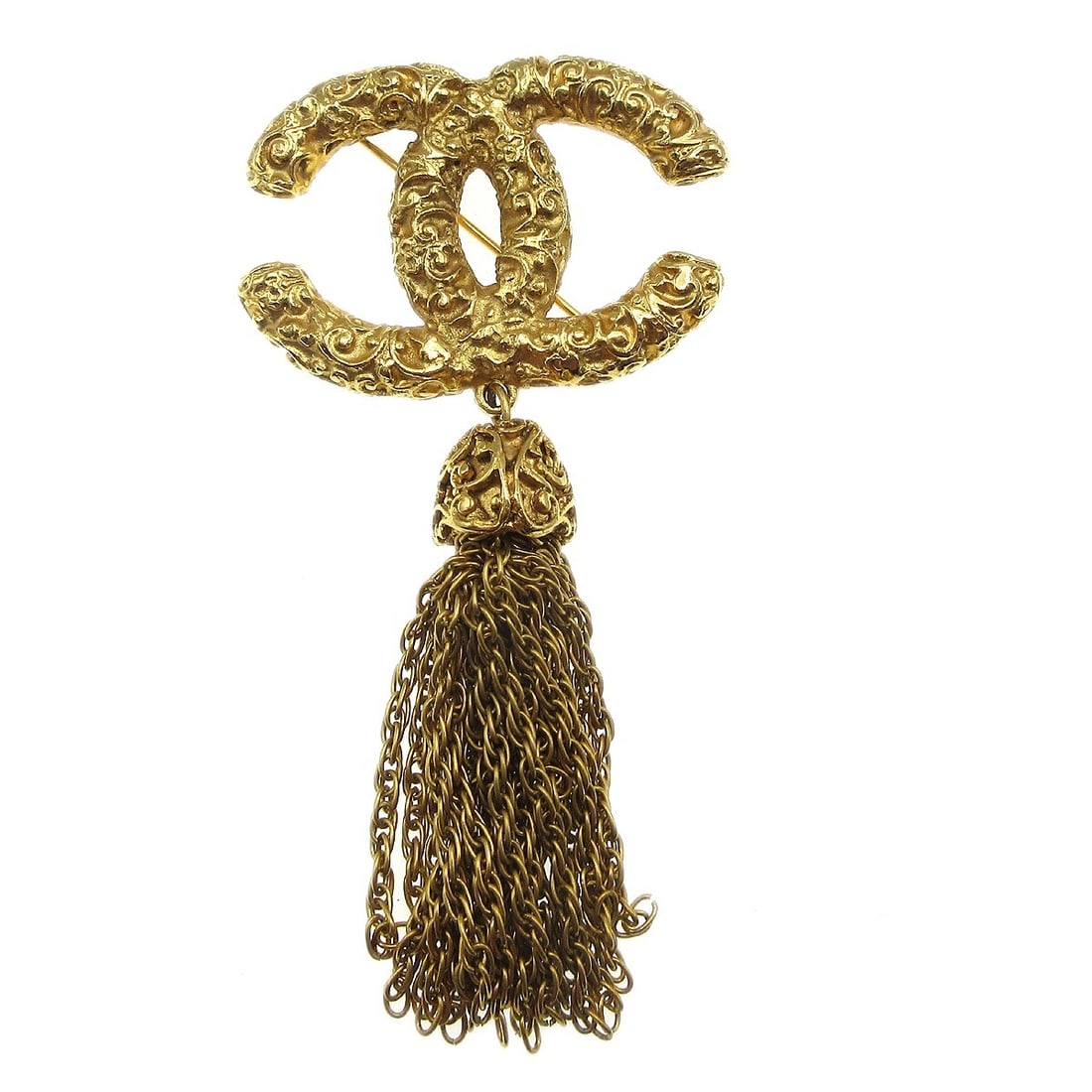 Chanel 93A Gold-Plated Fringe Brooch Pin Elegance: Chanel 93A Gold-Plated Fringe Brooch Pin Elegance This stunning Chanel Fringe Brooch Pin is an exquisite accessory that adds a touch of elegance to any outfit. Crafted from gold-plated metal, this pin