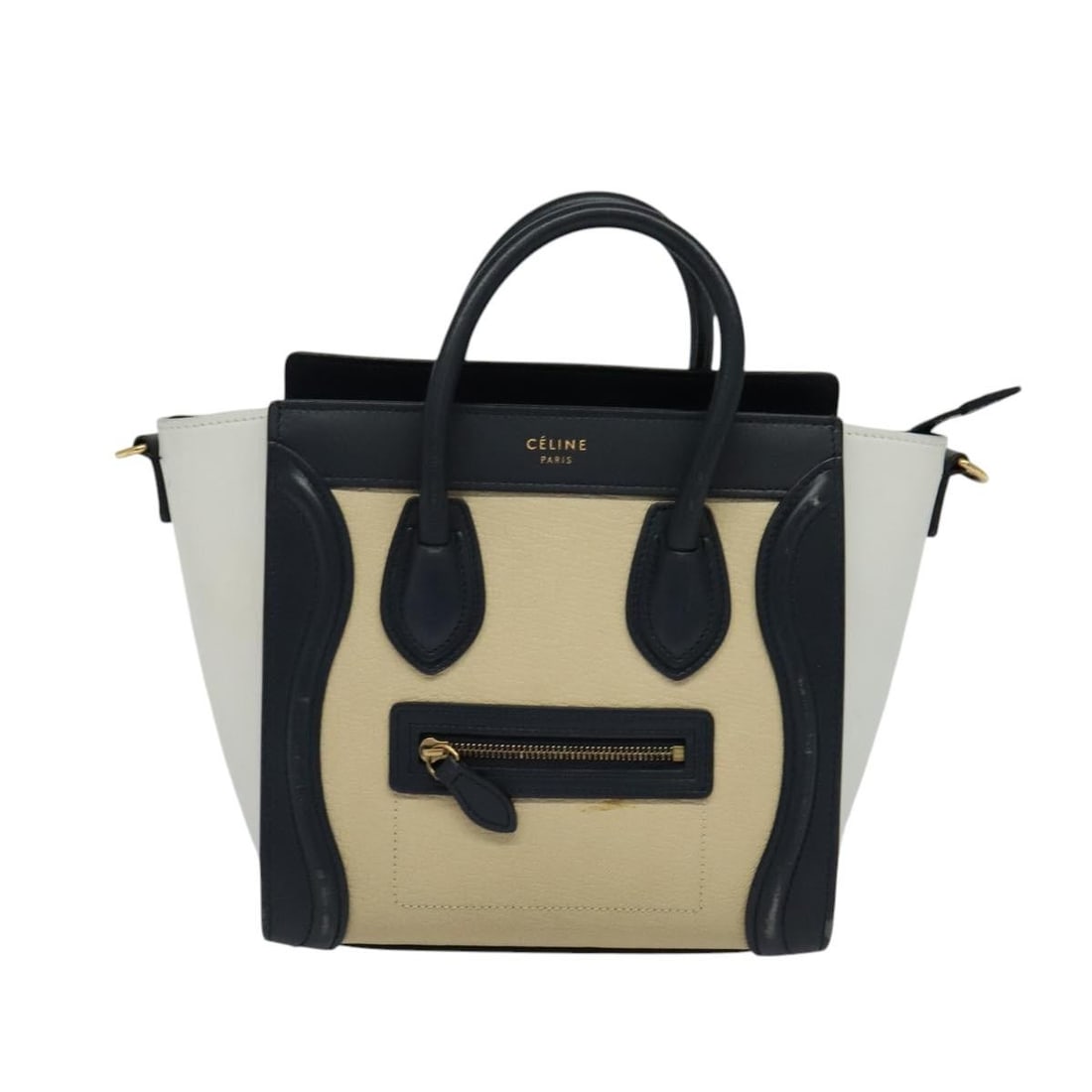 Tricolor Luggage Handbag by Celine in Beige: Tricolor Luggage Handbag by Celine in Beige This Celine Tricolor Luggage handbag in beige is designed for women and features a classic, structured silhouette. The bag has experienced slight shape loss