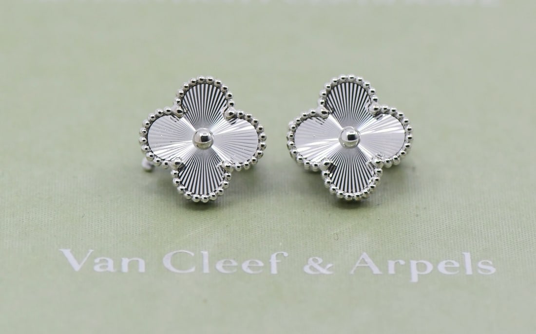 Vintage Alhambra 18K White Gold Stud Earrings by Van Cleef & Arpels: Vintage Alhambra 18K White Gold Stud Earrings by Van Cleef & Arpels These Van Cleef & Arpels Vintage Alhambra earrings are crafted from 18K white gold, featuring a classic stud style without any main