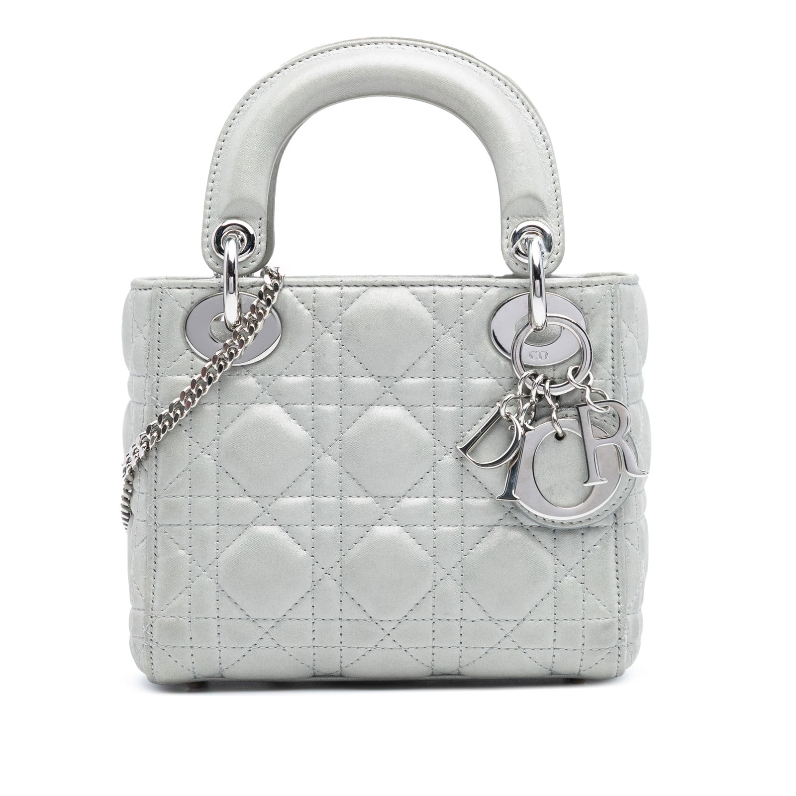 Dior Mini Iridescent Lambskin Cannage Lady Dior Bag Silver: Dior Mini Iridescent Lambskin Cannage Lady Dior Bag Silver The Mini Iridescent Lambskin Cannage Lady Dior bag showcases a stunning iridescent quilted lambskin leather exterior, exuding elegance and so