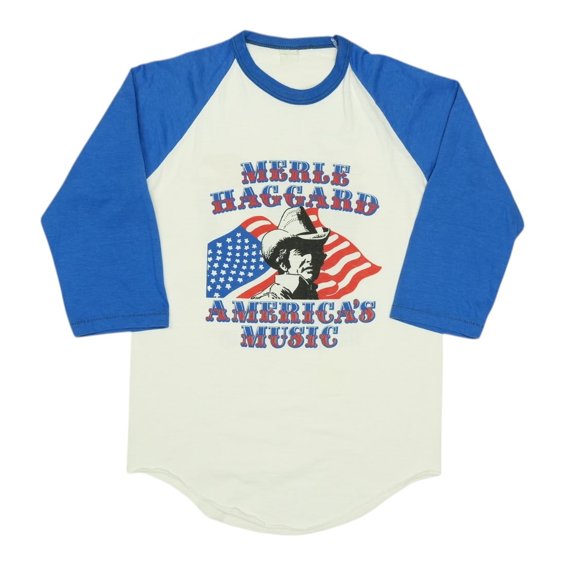 Vintage 1980s Merle Haggard America's Music Jersey Shirt: Vintage 1980s Merle Haggard America's Music Jersey Shirt Discover a true piece of music history with this original vintage 1980s Merle Haggard America's Music Jersey Shirt. This shirt features vibrant