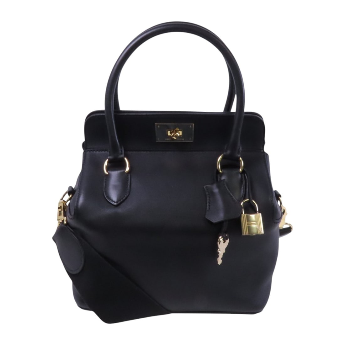 HERMES Tool Box 20 Black Swift Leather 2way Shoulder Bag: HERMES Tool Box 20 Black Swift Leather 2way Shoulder Bag This luxurious HERMES Tool Box 20 Handbag is designed for versatility as a 2-way shoulder bag. Crafted from high-quality calfskin leather, it f