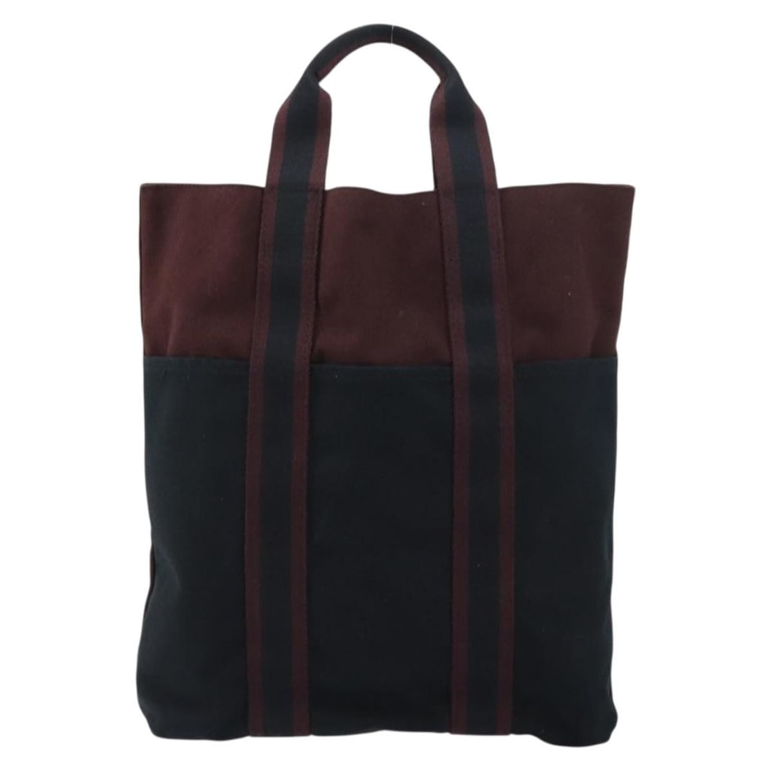 Herline Burgundy Tote by Hermes Fourre-tout: Herline Burgundy Tote by Hermes Fourre-tout This pre-owned Hermes Fourre-tout Herline tote bag in burgundy is designed for female use. It displays signs of wear, including loss of shape, rubbing, stai