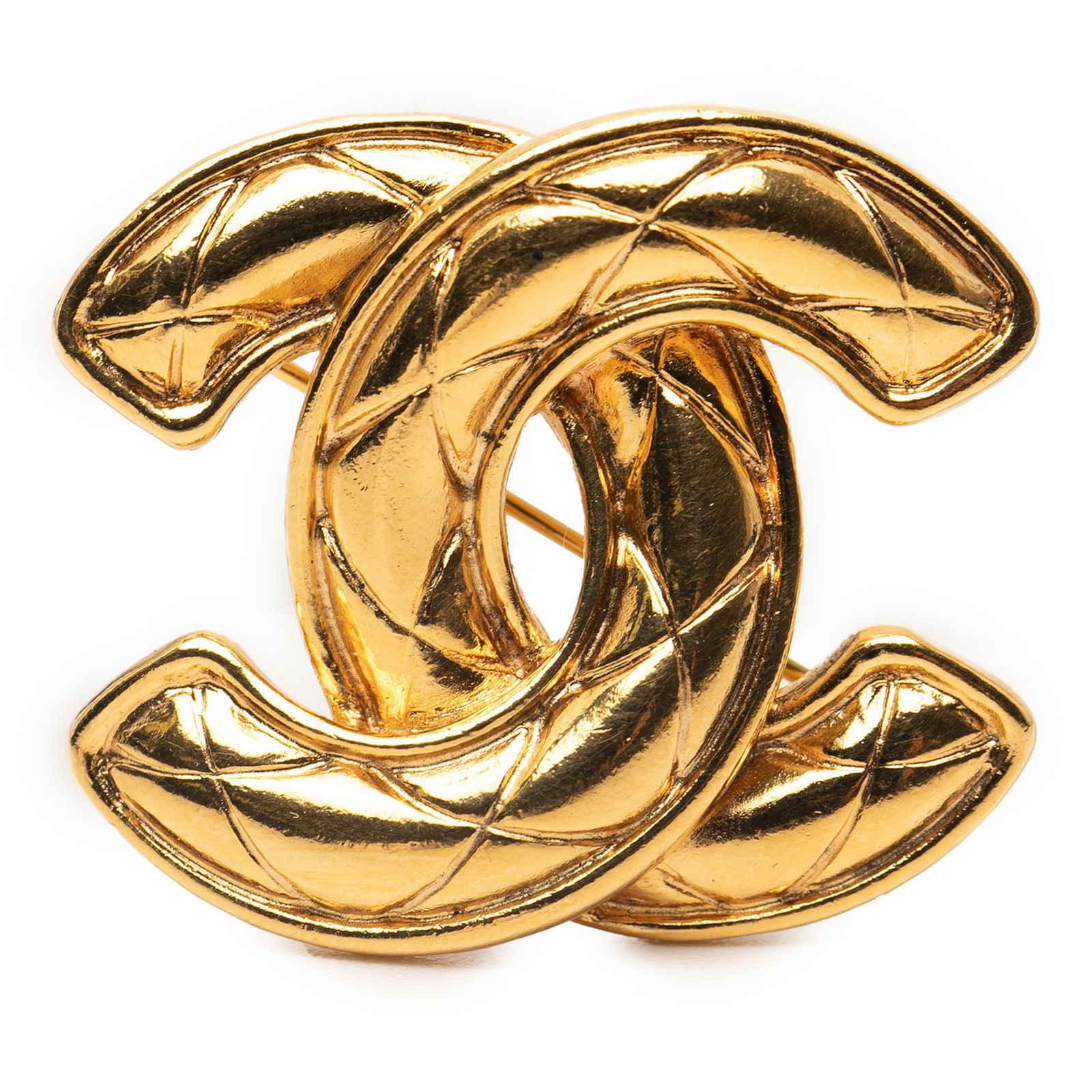 Chanel Gold Plated CC Quilted Costume Brooch France: Chanel Gold Plated CC Quilted Costume Brooch France This exquisite Chanel Gold Plated CC Quilted Brooch features a stunning gold-tone metal body and is secured with a reliable back pin closure. Crafte