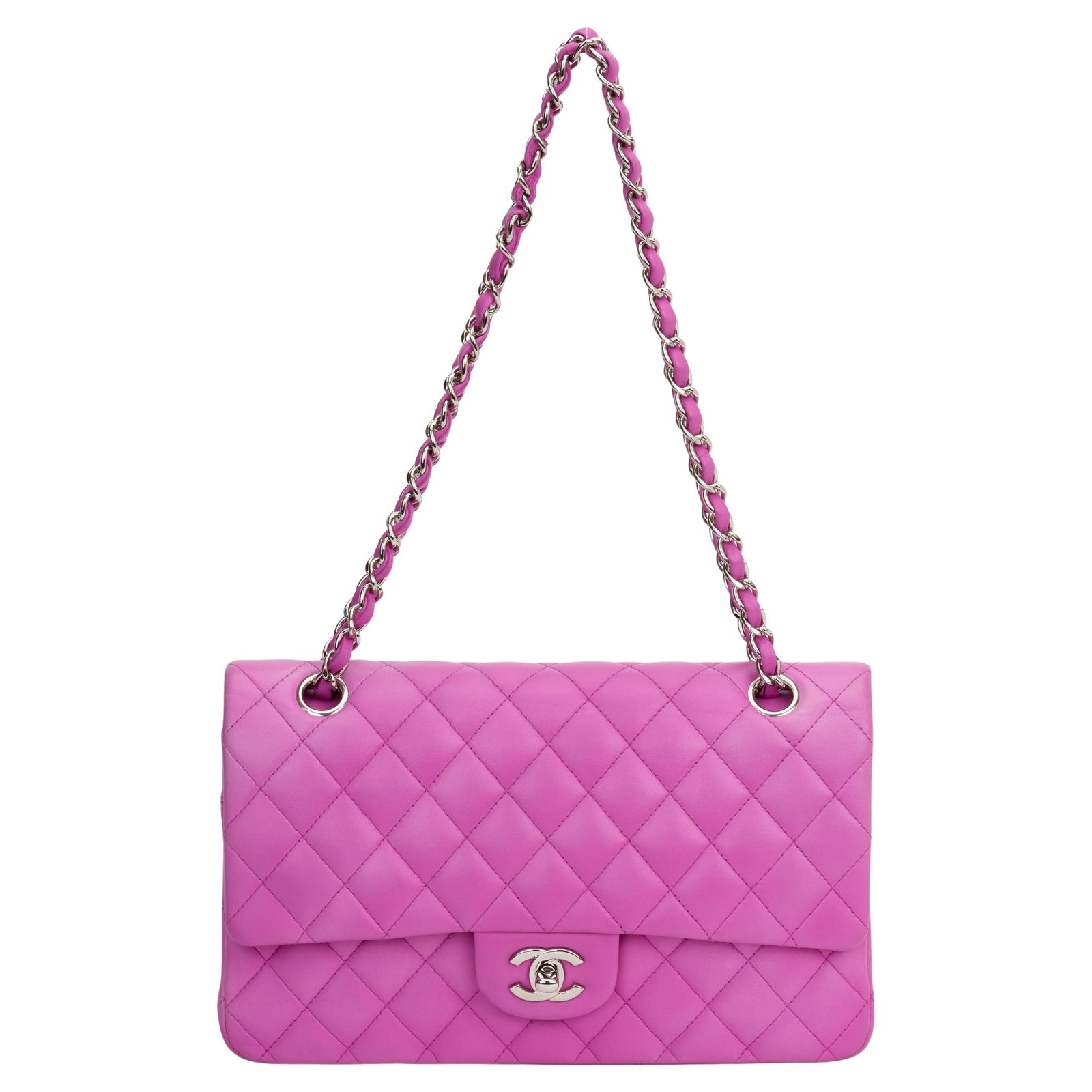 Chanel Classic Medium Double Flap Bag with Authenticity Card: Chanel Classic Medium Double Flap Bag with Authenticity Card This Chanel Classic Medium Double Flap Bag is a stunning accessory crafted from luxurious lambskin leather. The bag features striking silve