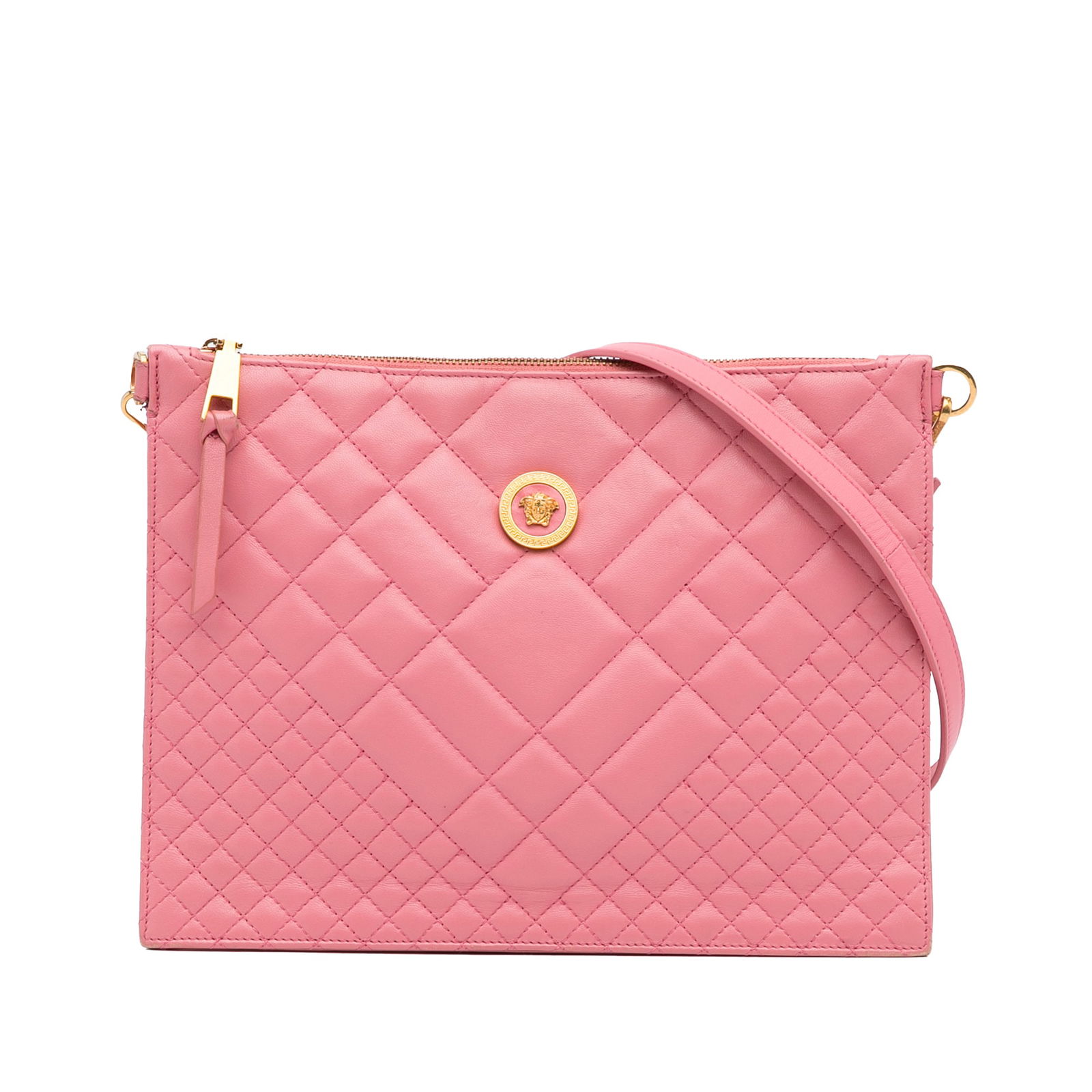 Versace Pink Quilted Medusa Crossbody Bag with Dust Bag: Versace Pink Quilted Medusa Crossbody Bag with Dust Bag The Versace Quilted Medusa Crossbody is a stylish and functional bag crafted from high-quality quilted leather. This chic accessory features a c