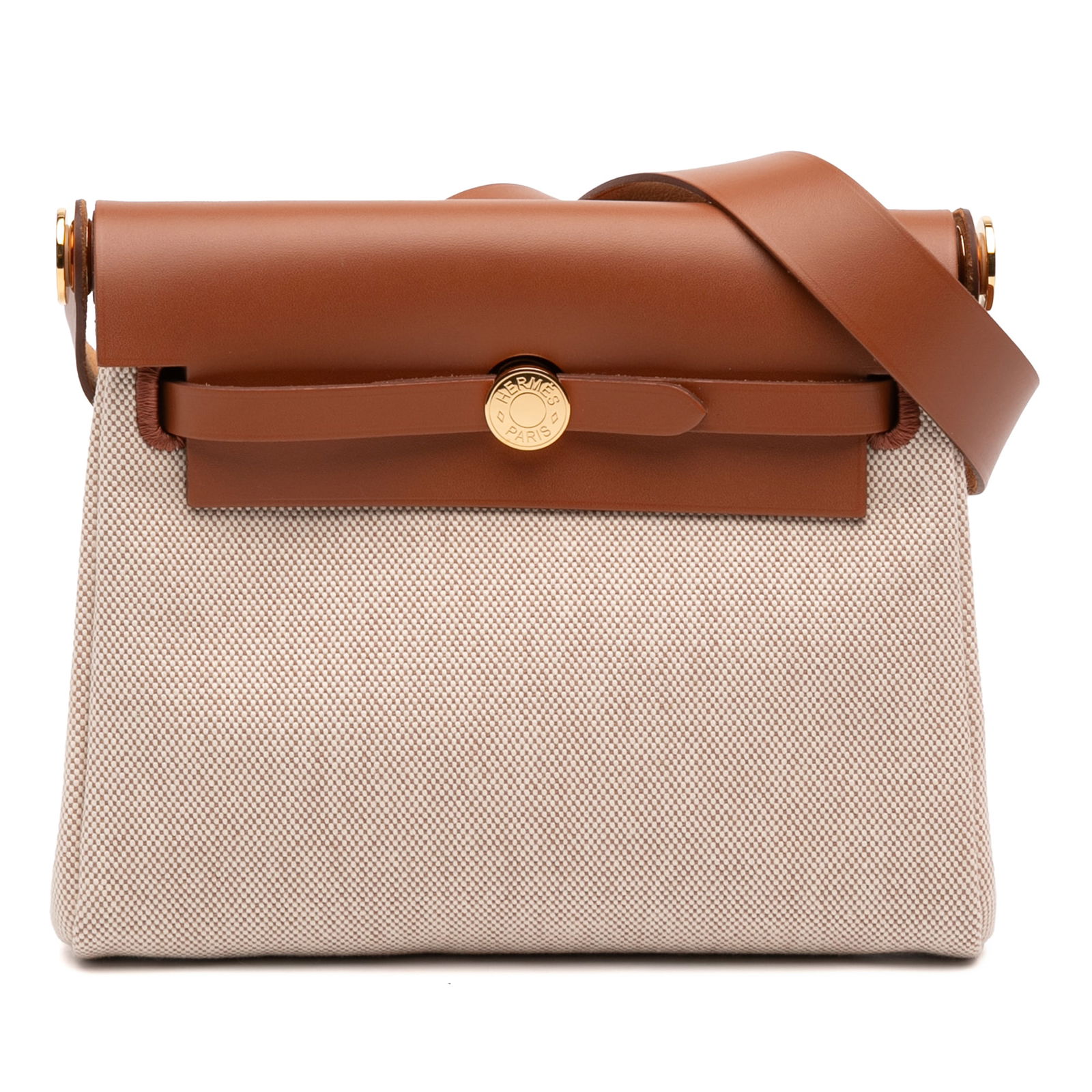 Herbag Zip 20 Crossbody in Military Toile and Vache Hunter Canvas: Herbag Zip 20 Crossbody in Military Toile and Vache Hunter Canvas The Hermes Military Toile and Vache Hunter Herbag Zip 20 is a crossbody bag crafted with a durable canvas body and a flat leather stra