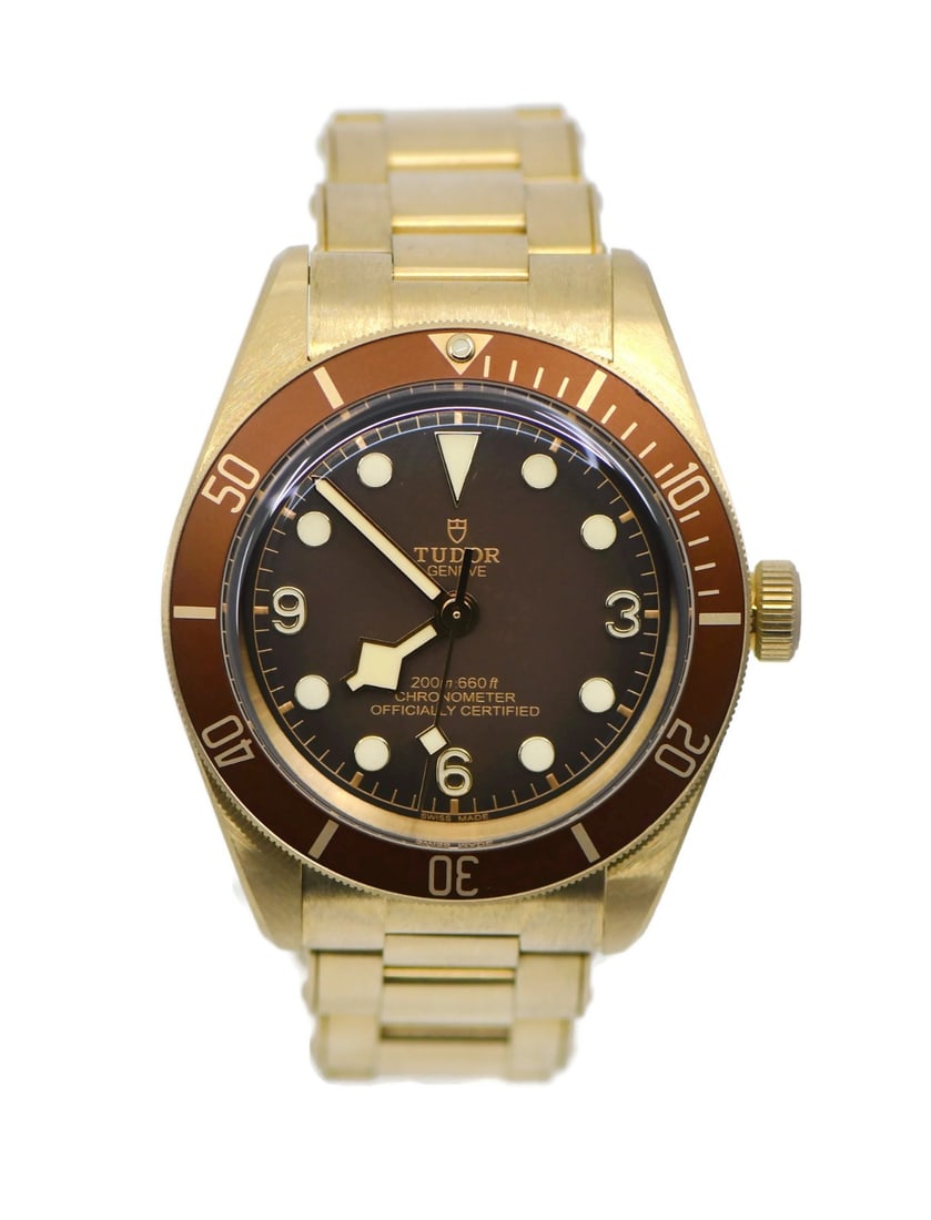 TUDOR Black Bay Fifty Eight Bronze 39mm Watch Ref 79012M with Box and Papers: TUDOR Black Bay Fifty Eight Bronze 39mm Watch Ref 79012M with Box and Papers Introducing the Tudor Black Bay Fifty-Eight Bronze Watch, model 79012M. This exquisite wristwatch features a robust 39 mm b