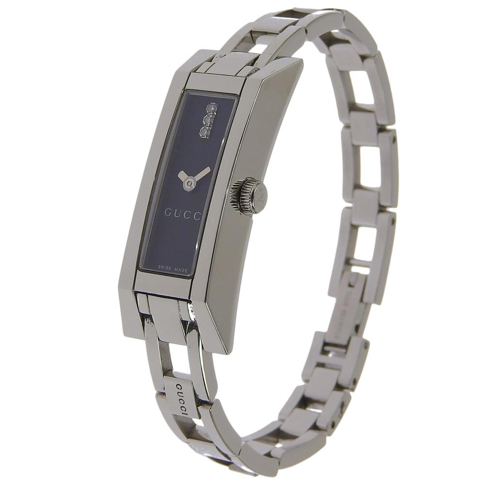 Women's G-Frame Rectangular Bangle Watch by Gucci Quartz Movement: Women's G-Frame Rectangular Bangle Watch by Gucci Quartz Movement This Gucci G-Frame rectangular bangle quartz watch features a sleek and feminine design. The watch displays minor scratches on the bod