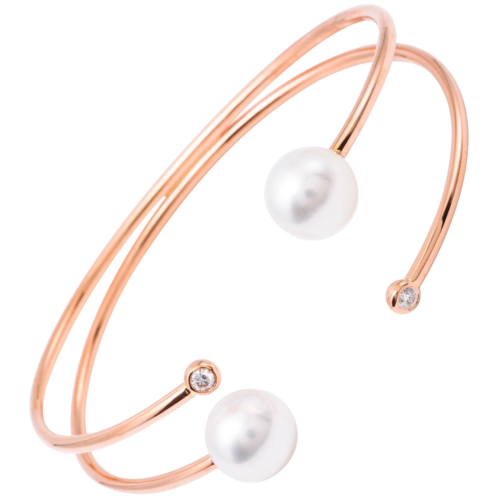 Harbor Diamonds 18K Rose Gold Bangle with South Sea Pearls and Diamonds: Harbor Diamonds 18K Rose Gold Bangle with South Sea Pearls and Diamonds This exquisite bangle bracelet is crafted from 18k rose gold and features two stunning South Sea pearls, each measuring 9.50-10